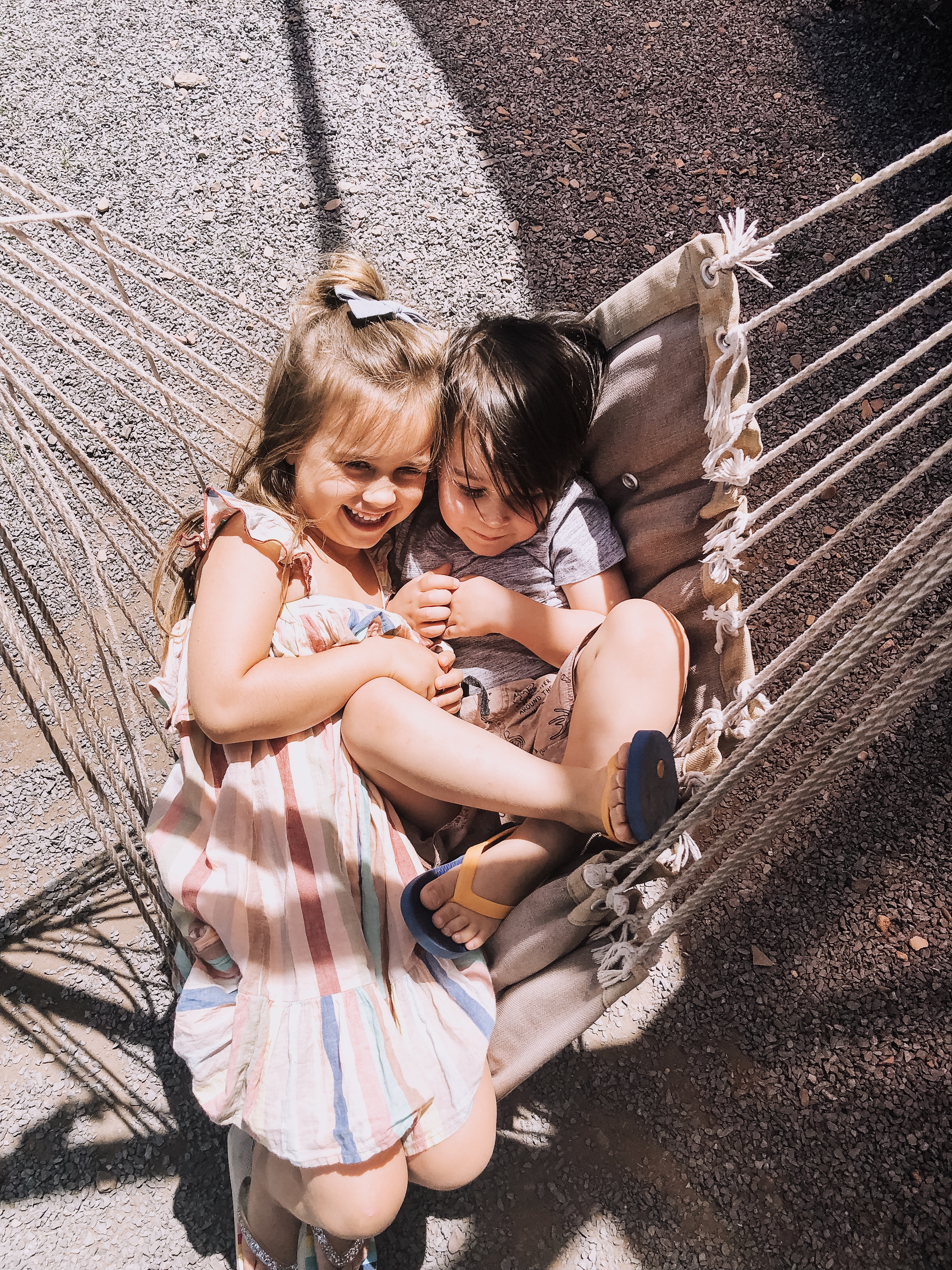 two kids in a hammock