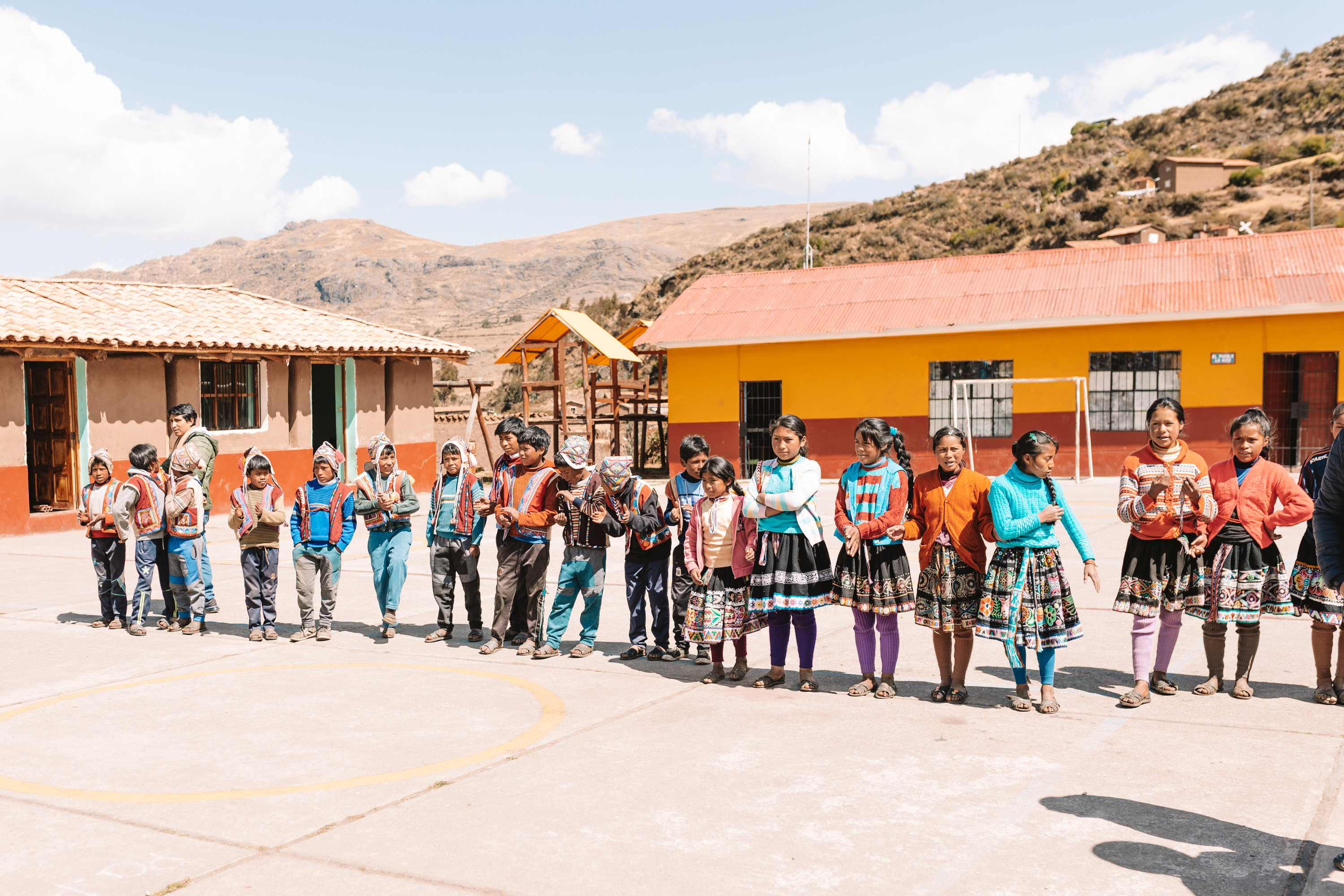 a ceremony at a local Quechuan school in Peru #magicaljourney #peru