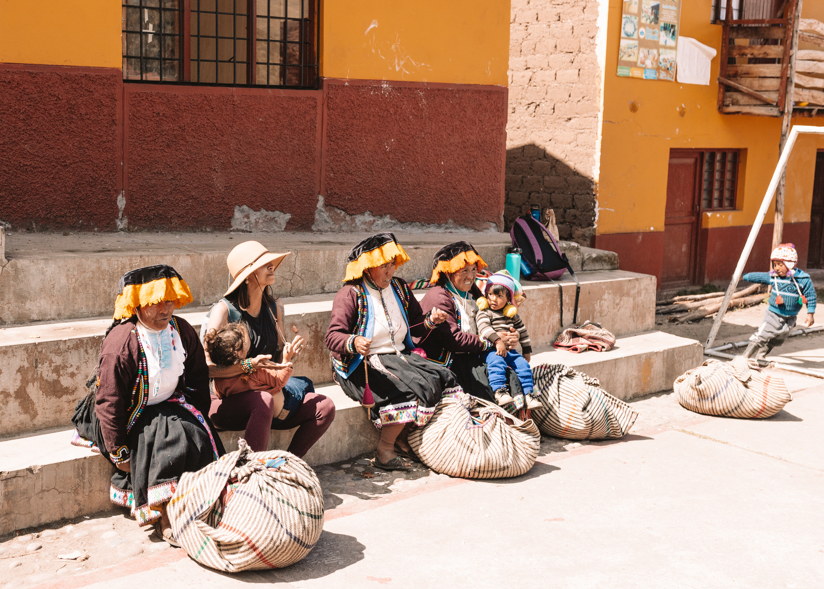 mothers of different cultures, sitting together as one #peru #motherhood