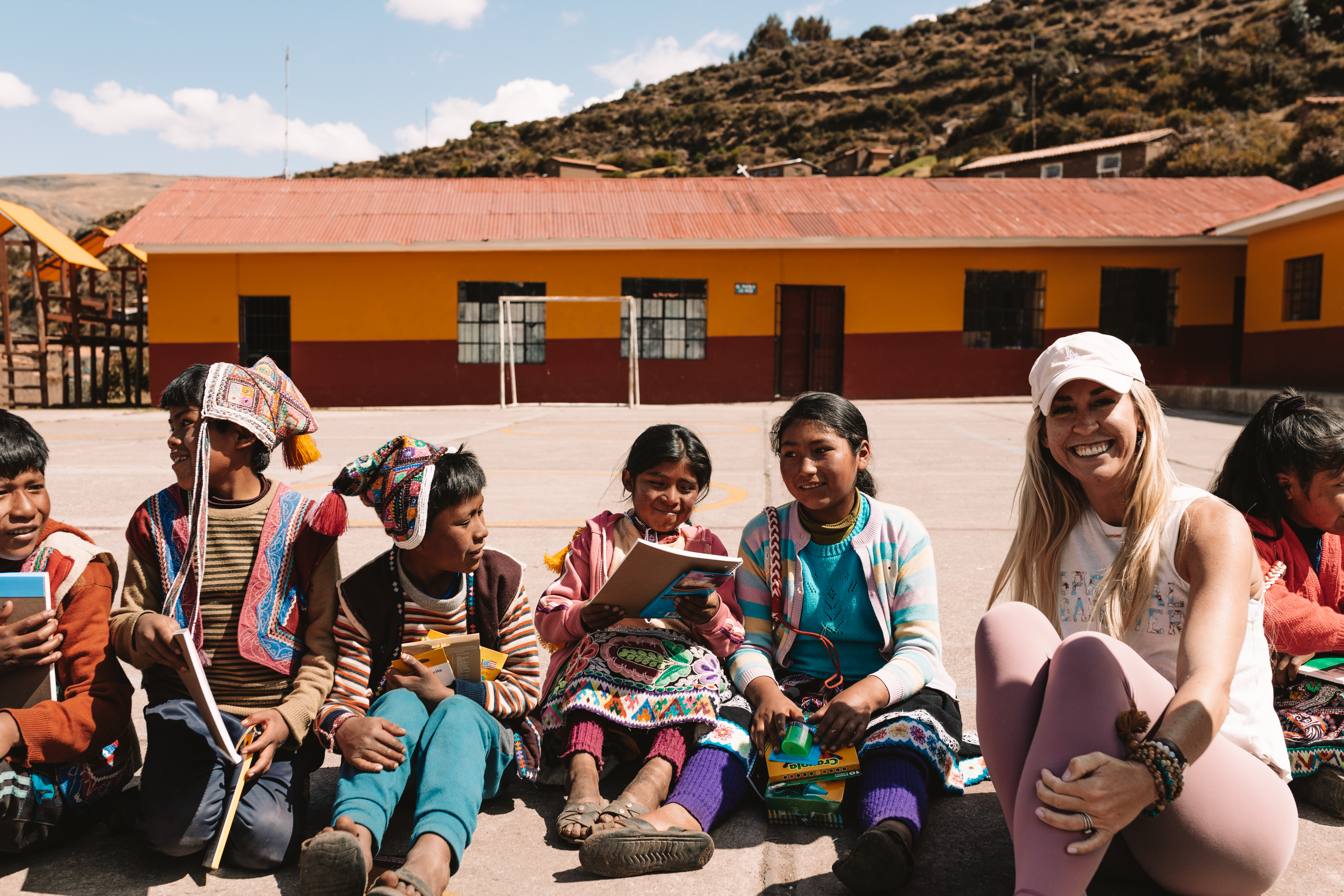 sitting with the children of the school in the Andean mountains of Peru