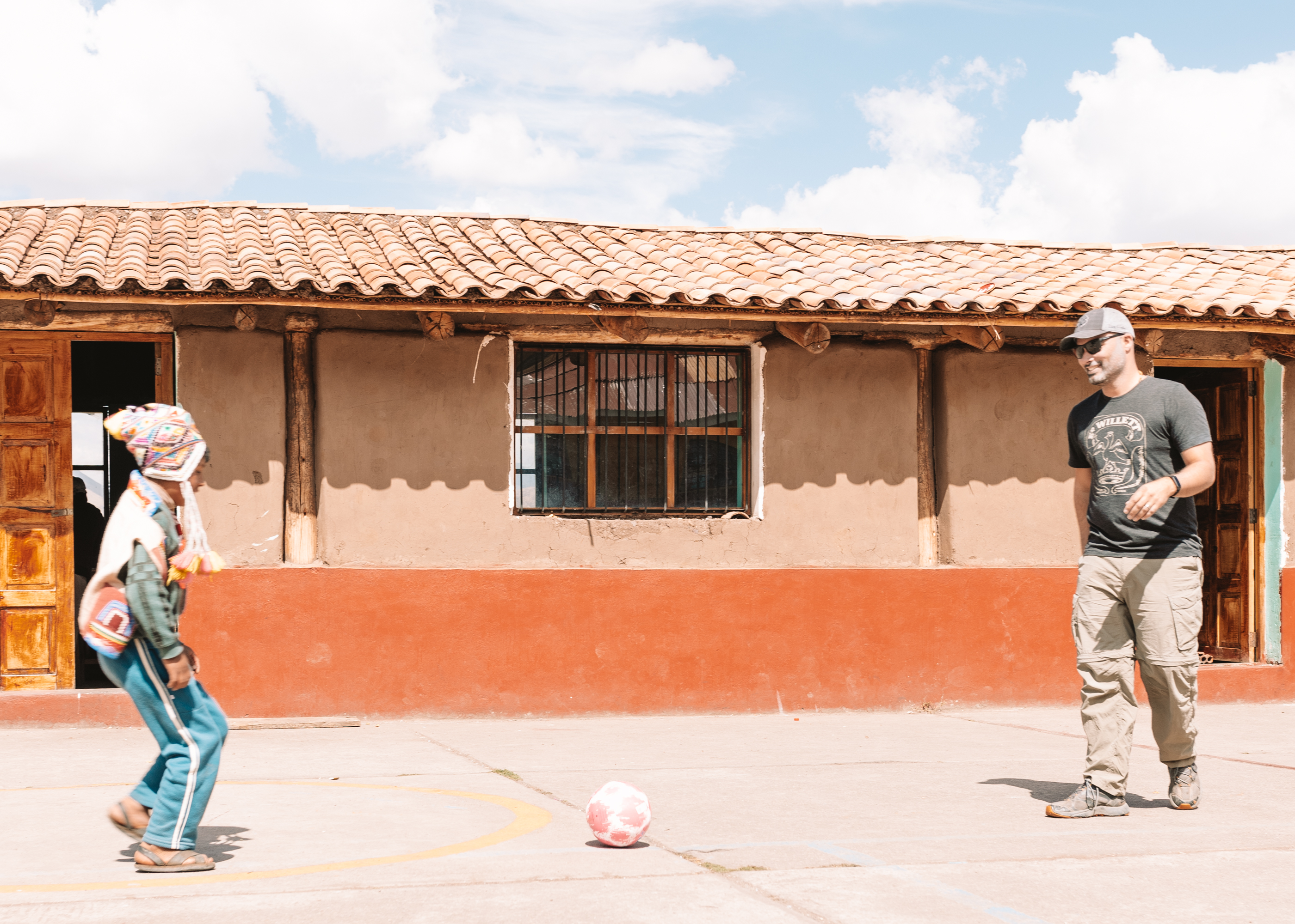 playing futbol with the school children in Peru