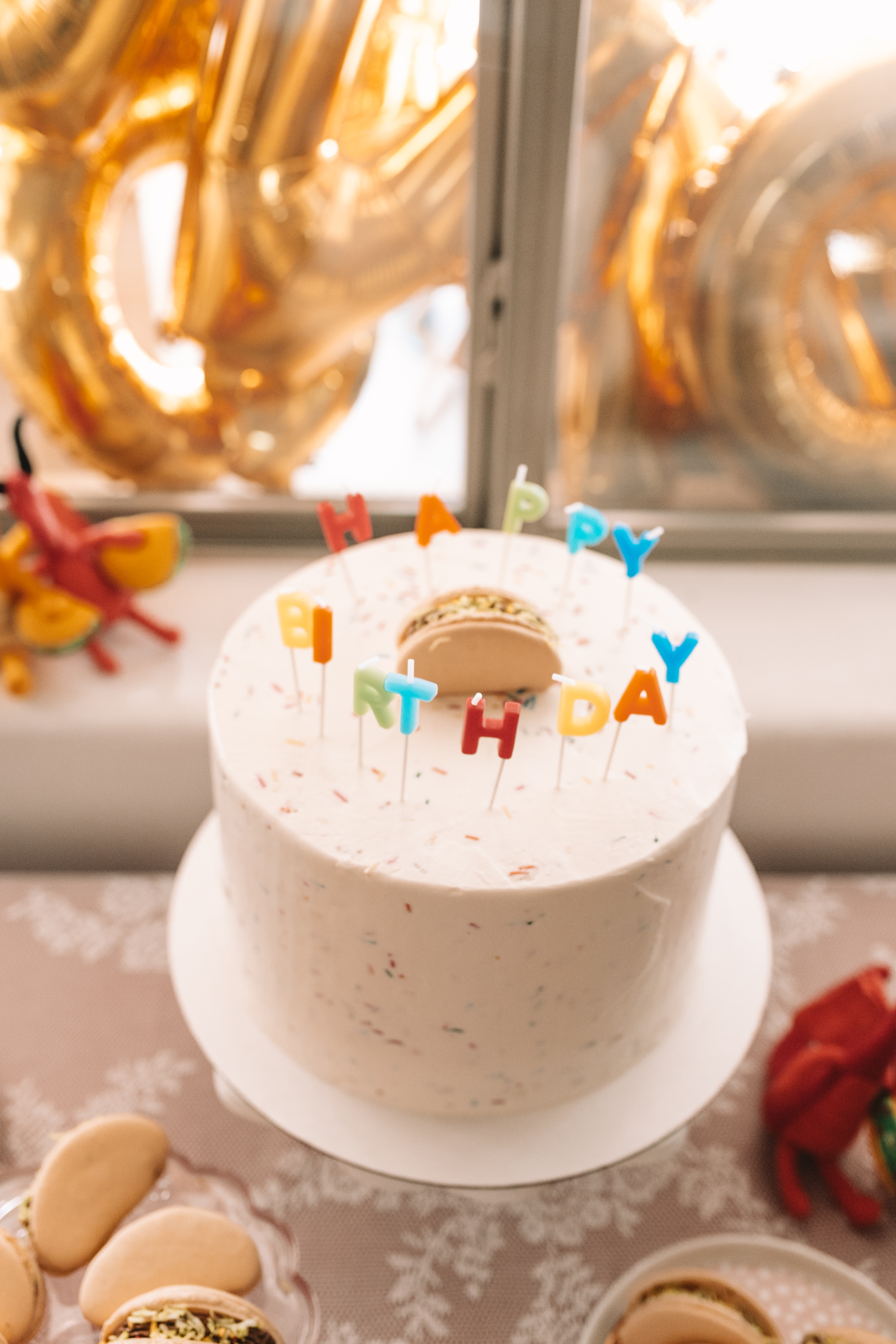 the perfect funfetti cake with a taco macaroon on top.