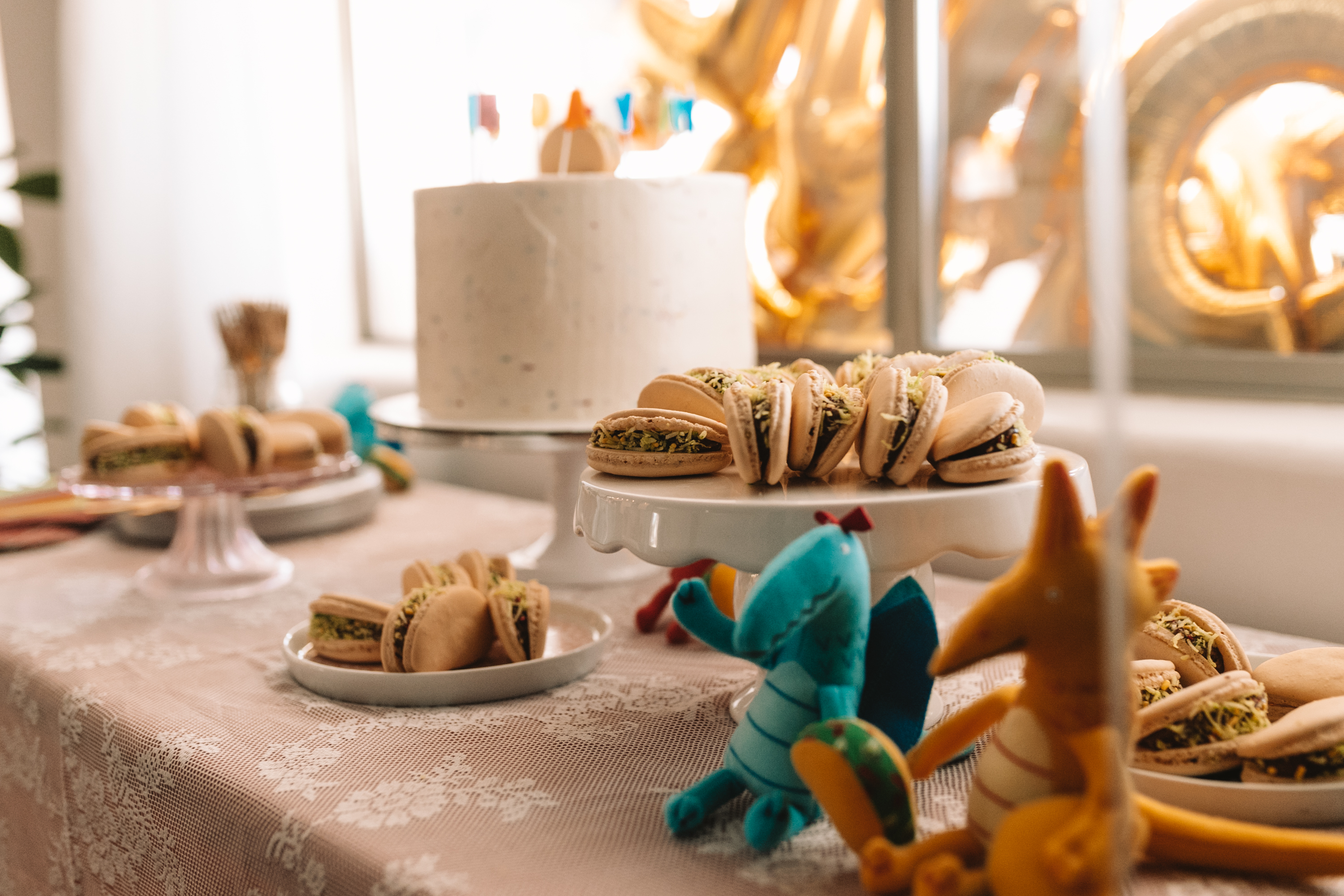 the cutest little taco macaroons for the desert table this kid's birthday party!