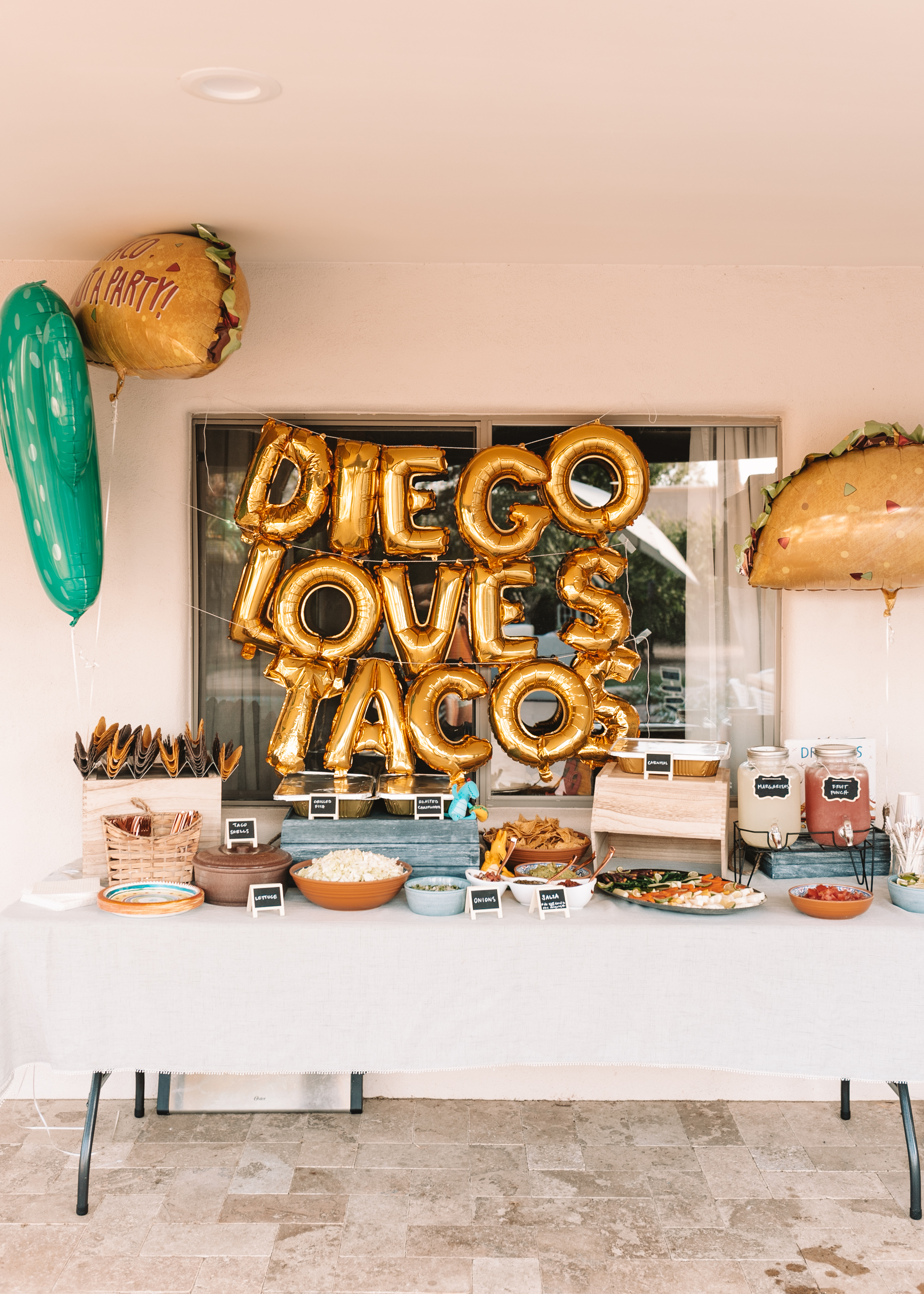 taco bar for a dragons love tacos birthday party.