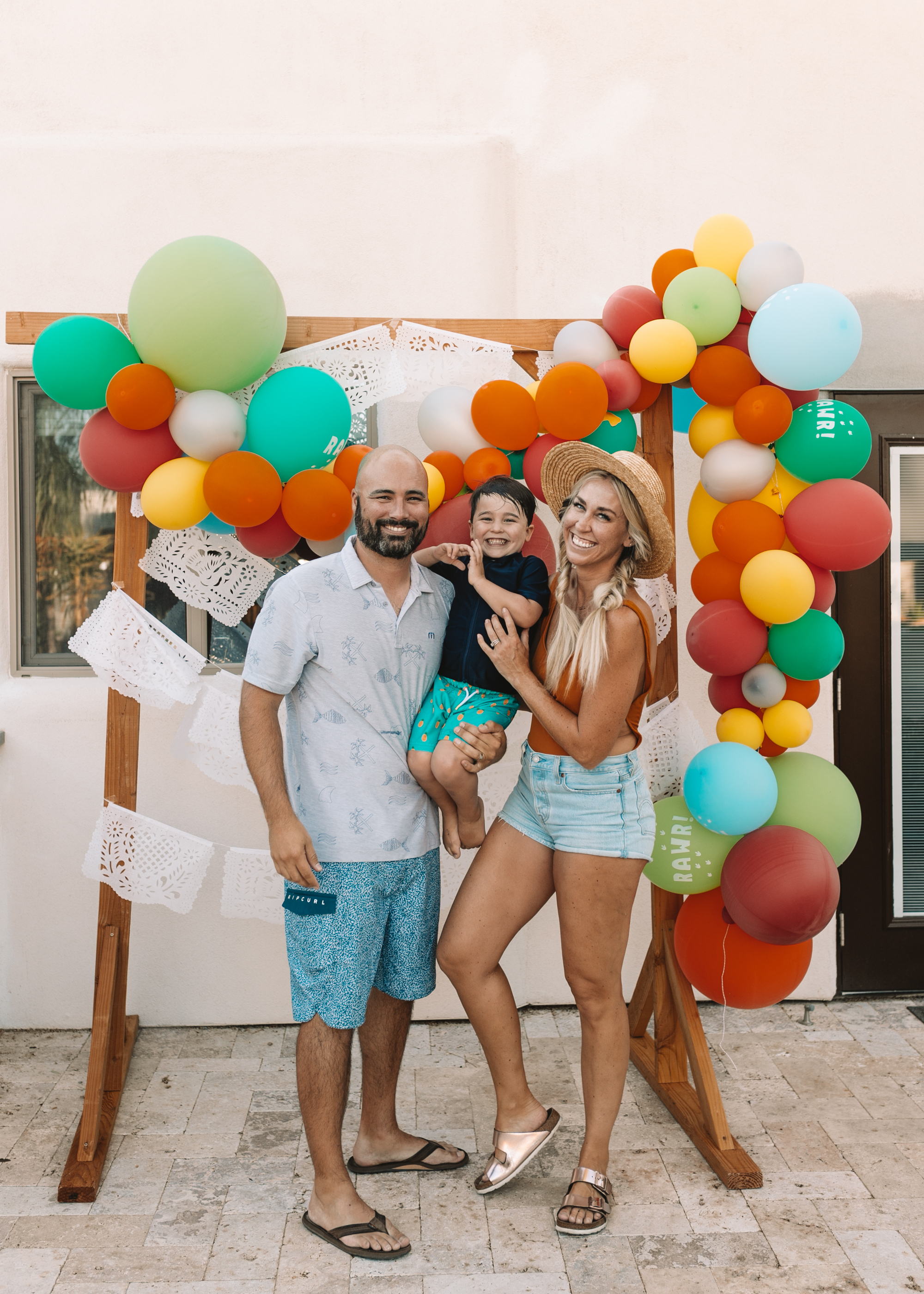 celebrating four with a dragons love tacos pool birthday party. #kidsbirthday #birthdayparty #dragonslovetacos #balloonarch #diy #family