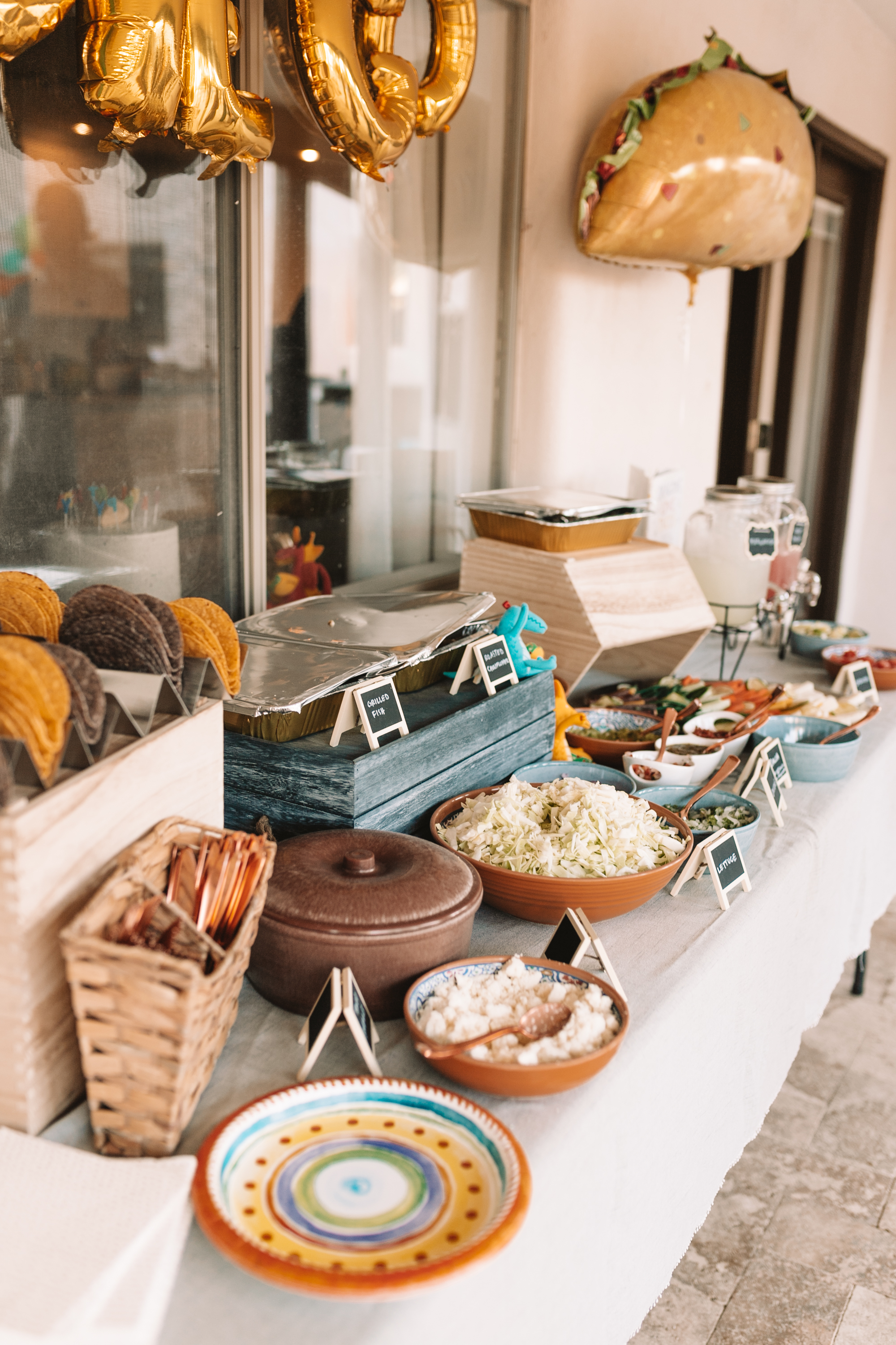 taco bar all ready for the dragons at this kid's birthday party!