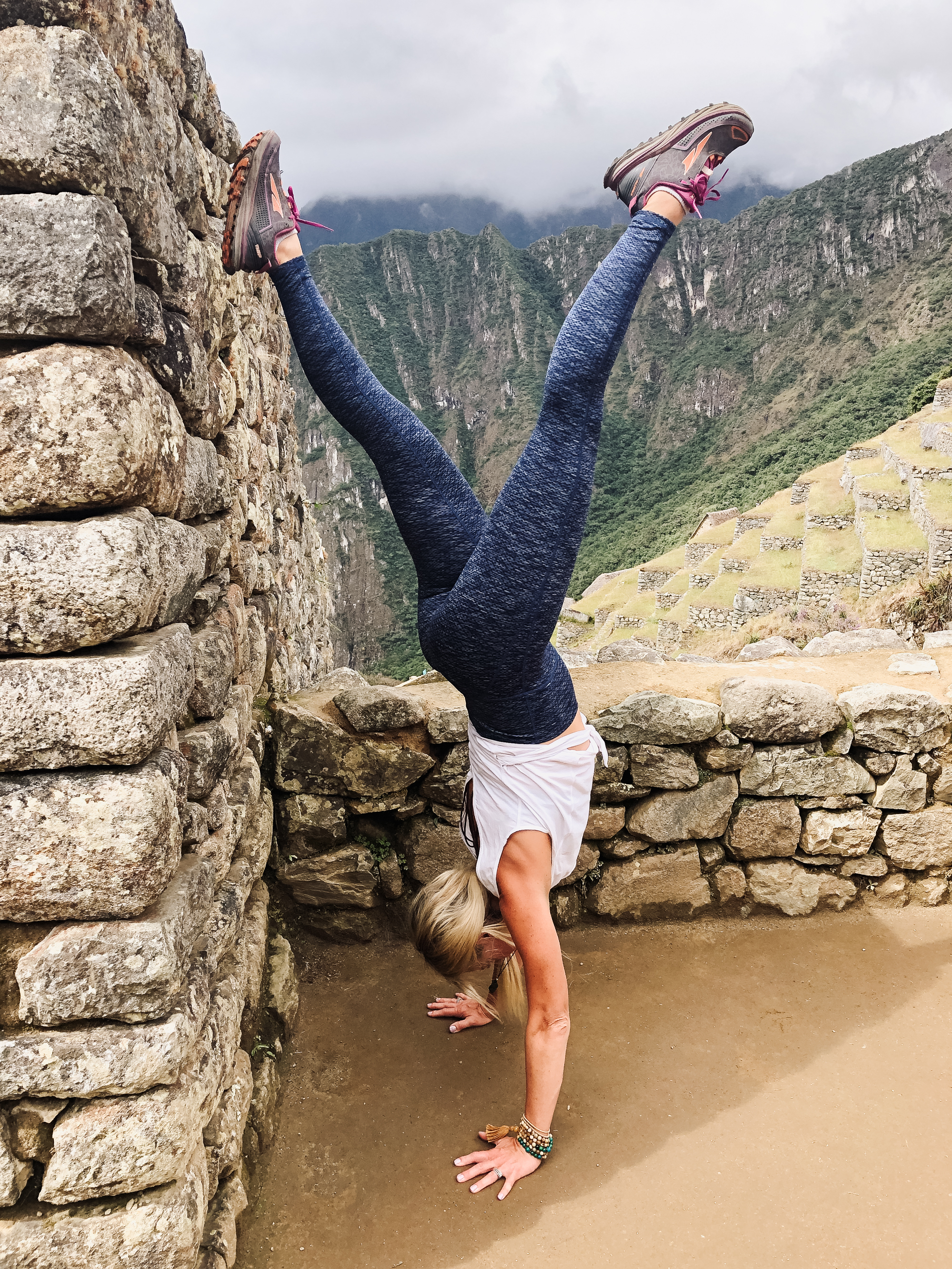 handstanding at machu picchu during our magical trip to peru. #peru #handstand #yogaretreat
