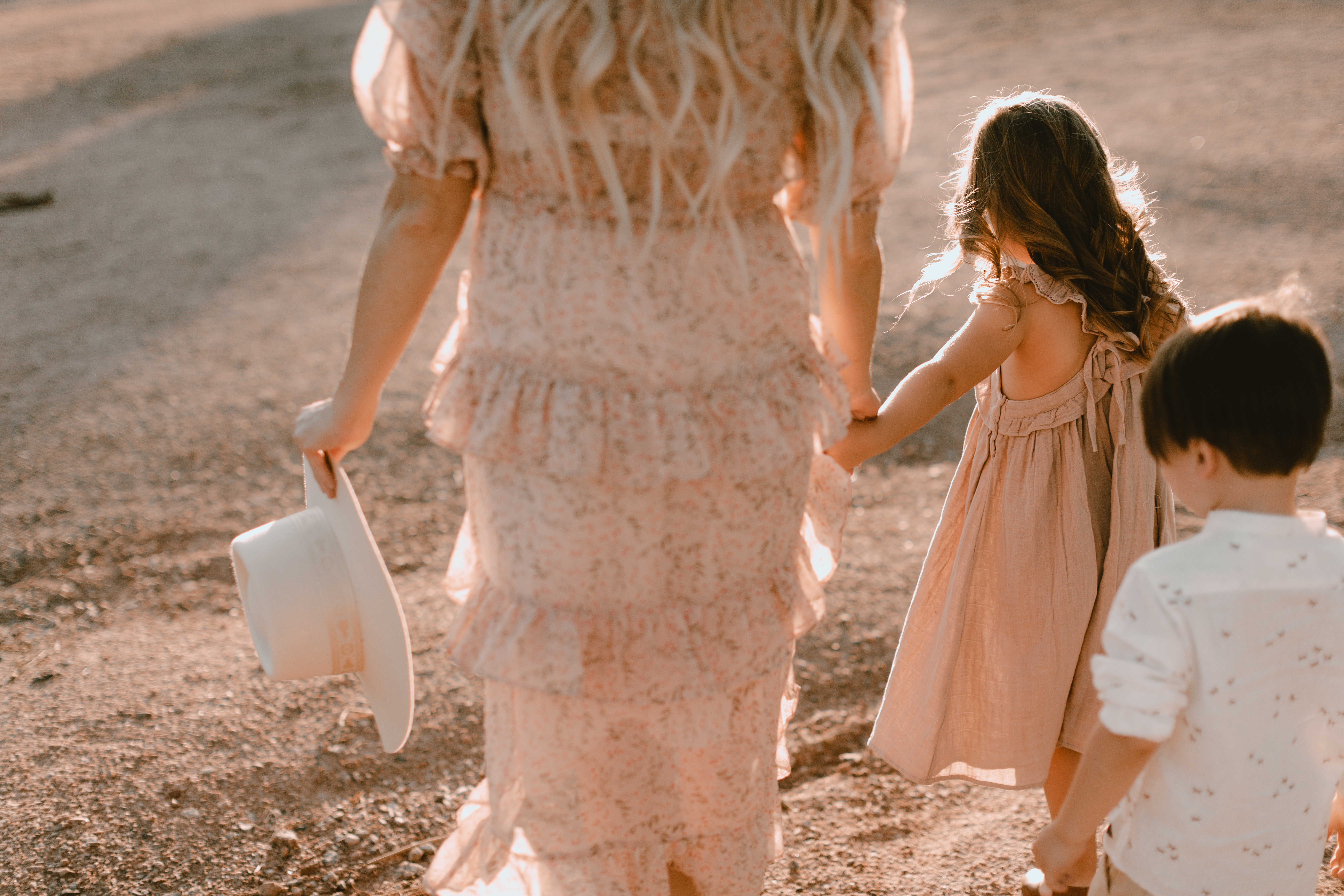 mother and children walking through golden hour. #thelovedesignedlife #childhood #motherhood #familyphotos