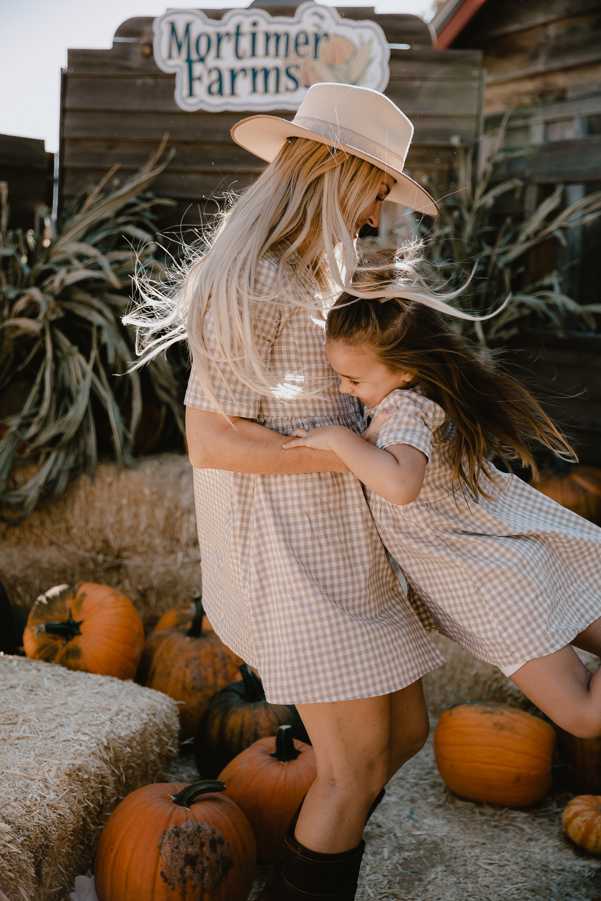 swinging my girl at the pumpkin patch for some fall fun in the desert.