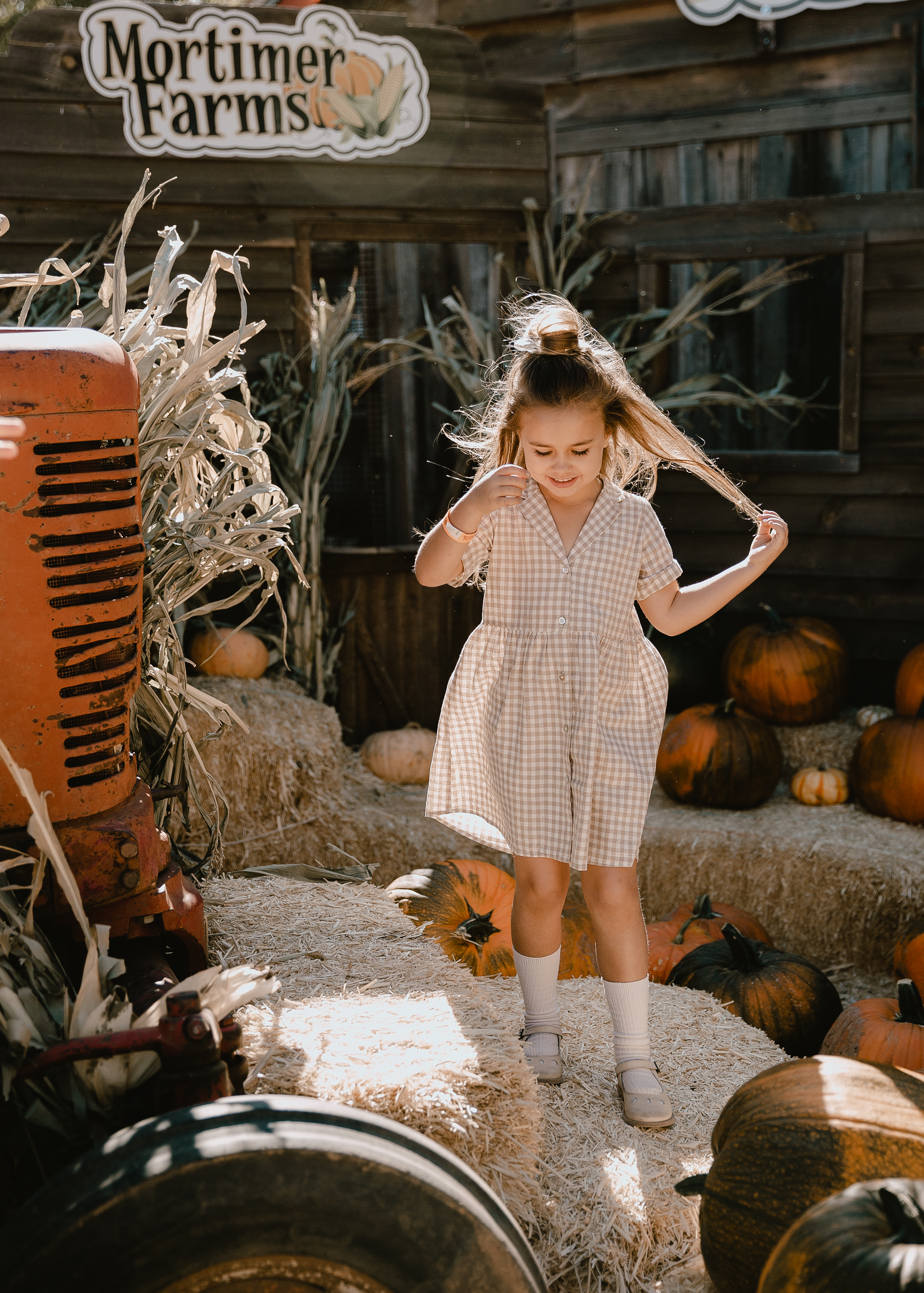 I love this sweet Rylee & Cru dress on my little girl. Perfect for our pumpkin patch visit! #fallfun #pumpkinpatch #ministyle