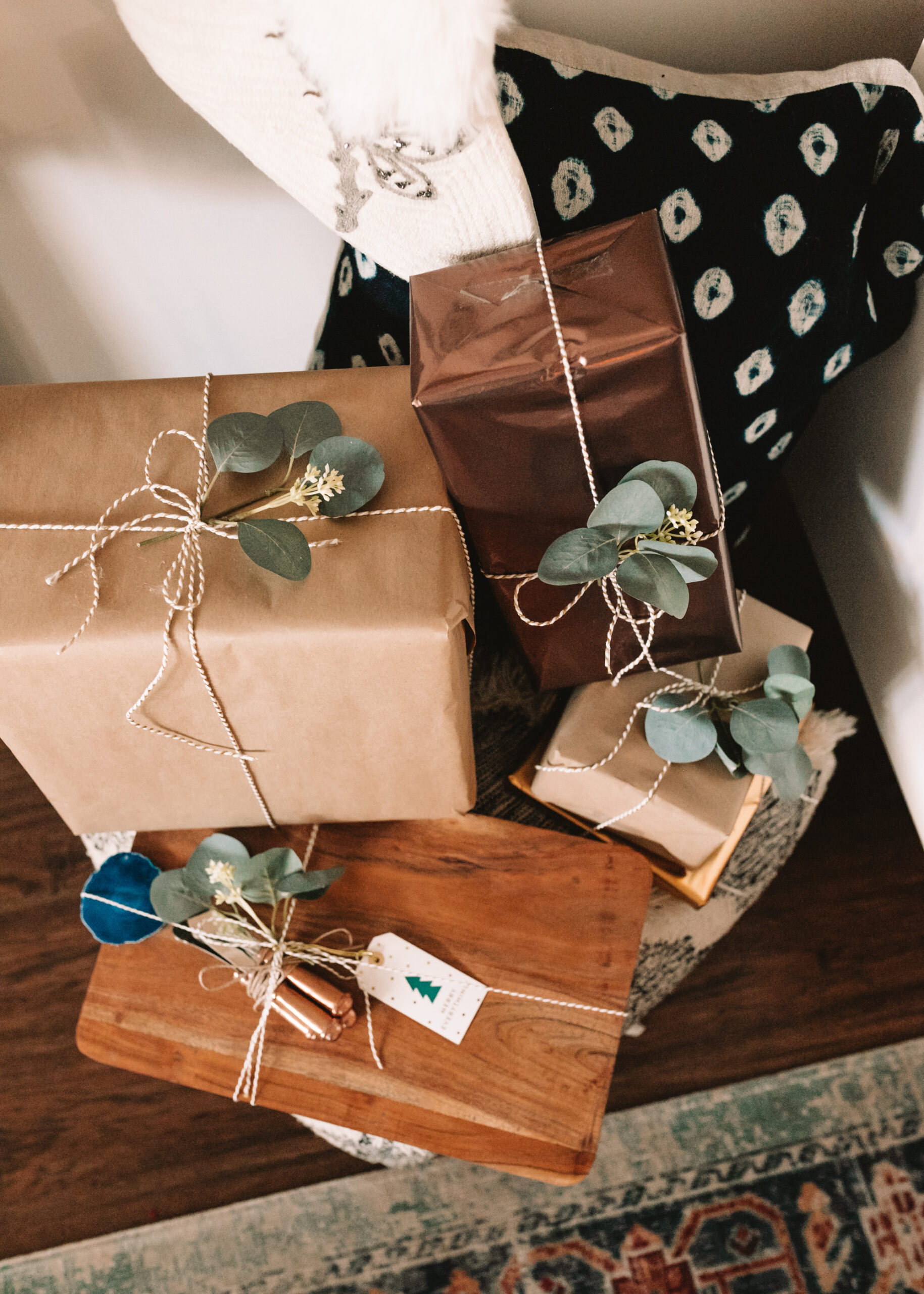 brown paper packages tied up with strings, all ready for holiday gifting! #thelovedesignedlife #holidaygiftguide #wrappingpaper 