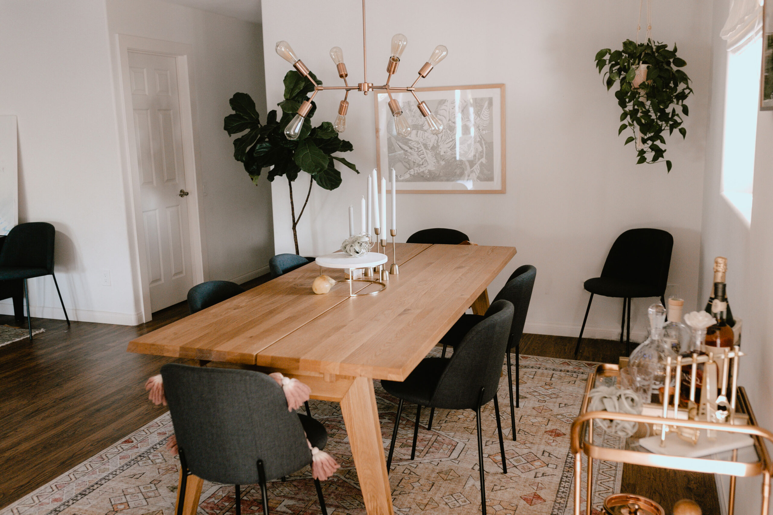 love the solid oak of this gorgeous dining table from article. #theldlhome #article #moderndiningroom 