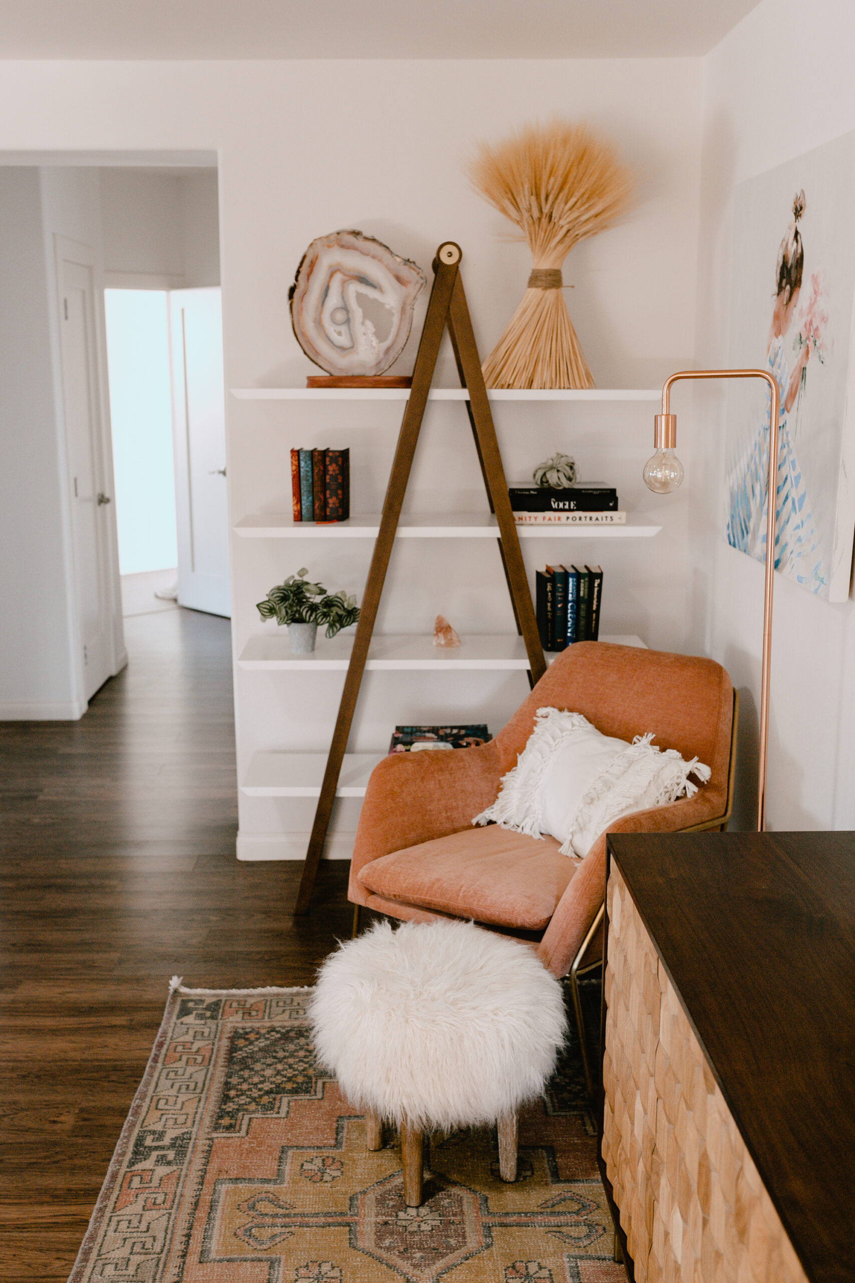 love this beautiful bookshelf from article in the awkward corner of our older home. #thelovedesignedlife #theldlhome #livingroom #cornerchair #bookshelf