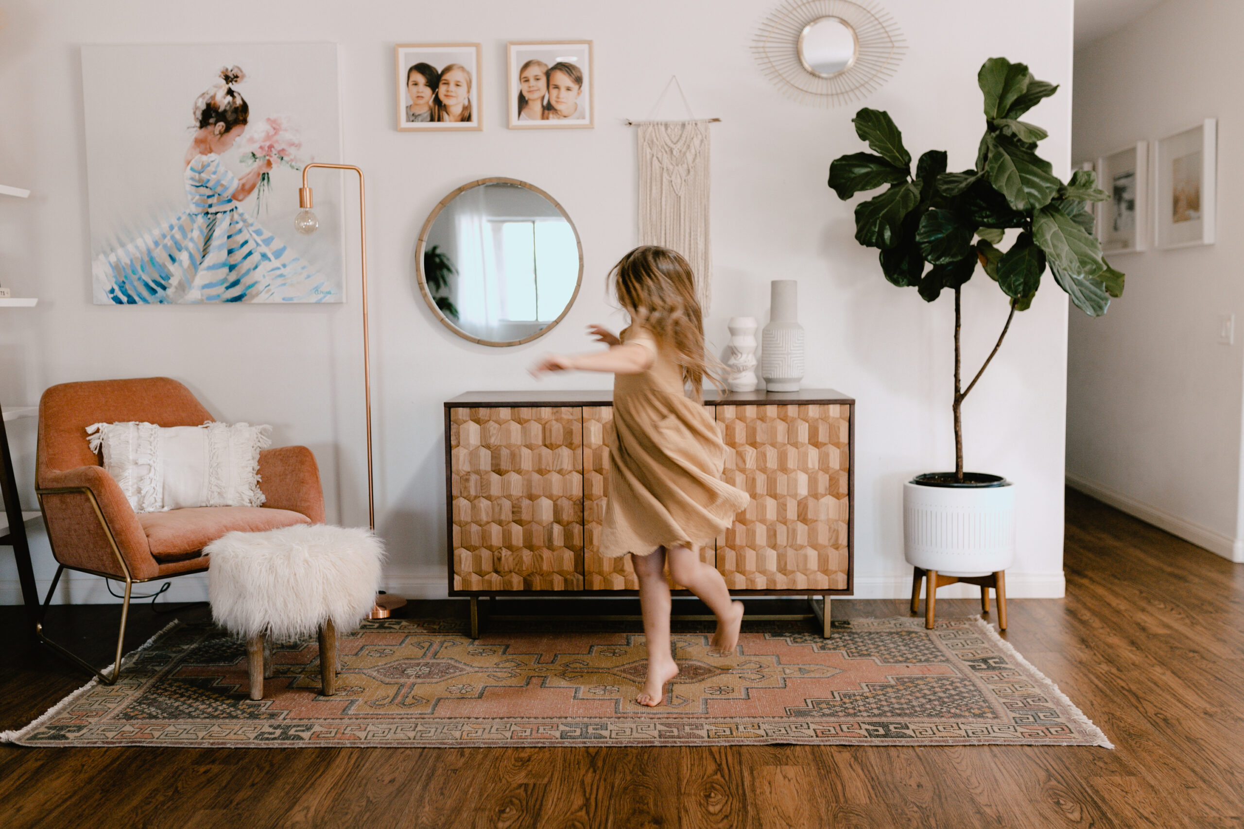 un updated corner with a beautiful dining buffet and a twirling little girl. #theldlhome #homedesign #beautifulspaces