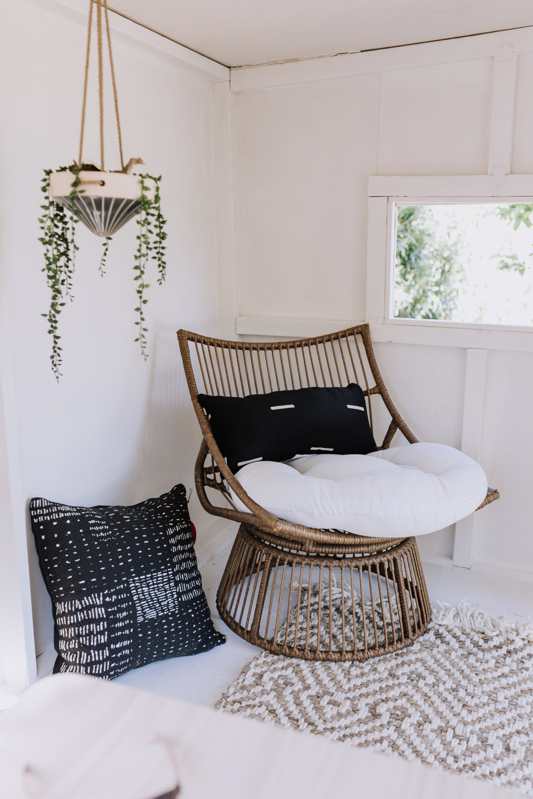 a cozy corner in the kids' backyard clubhouse, created by Homegirl Made. #theldlhome #clubhouse #homegirlhandmade