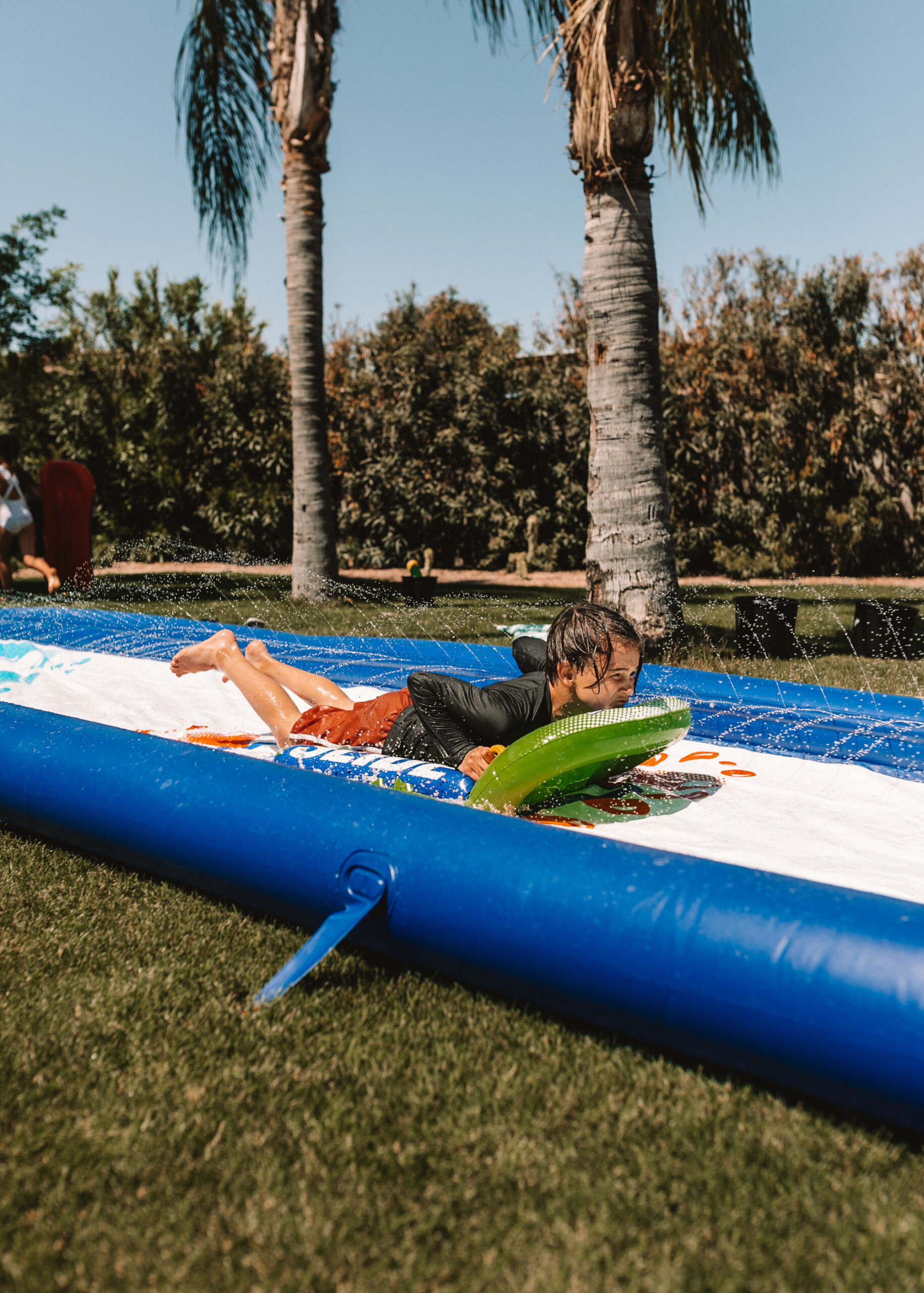 slip and slide water fun for our backyard field day! #slipandslide #backyardfun