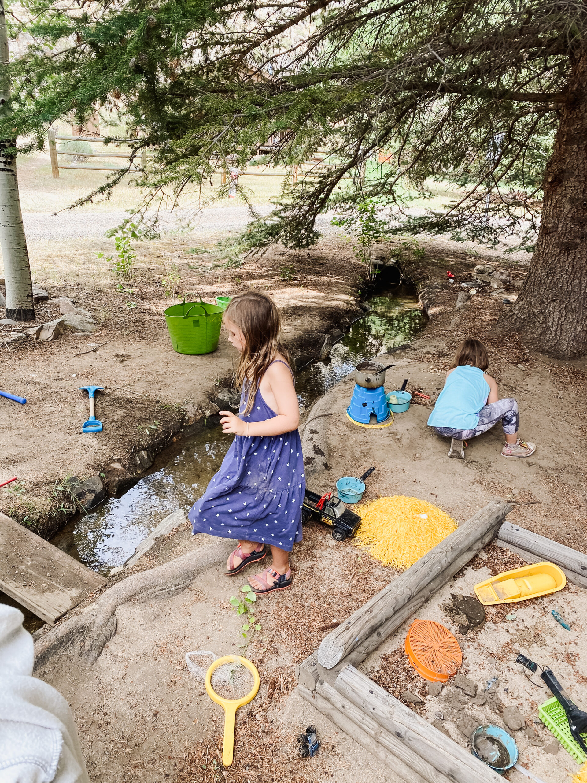 making mud pies in the ditch. #camping #mudpies #outdoorplay