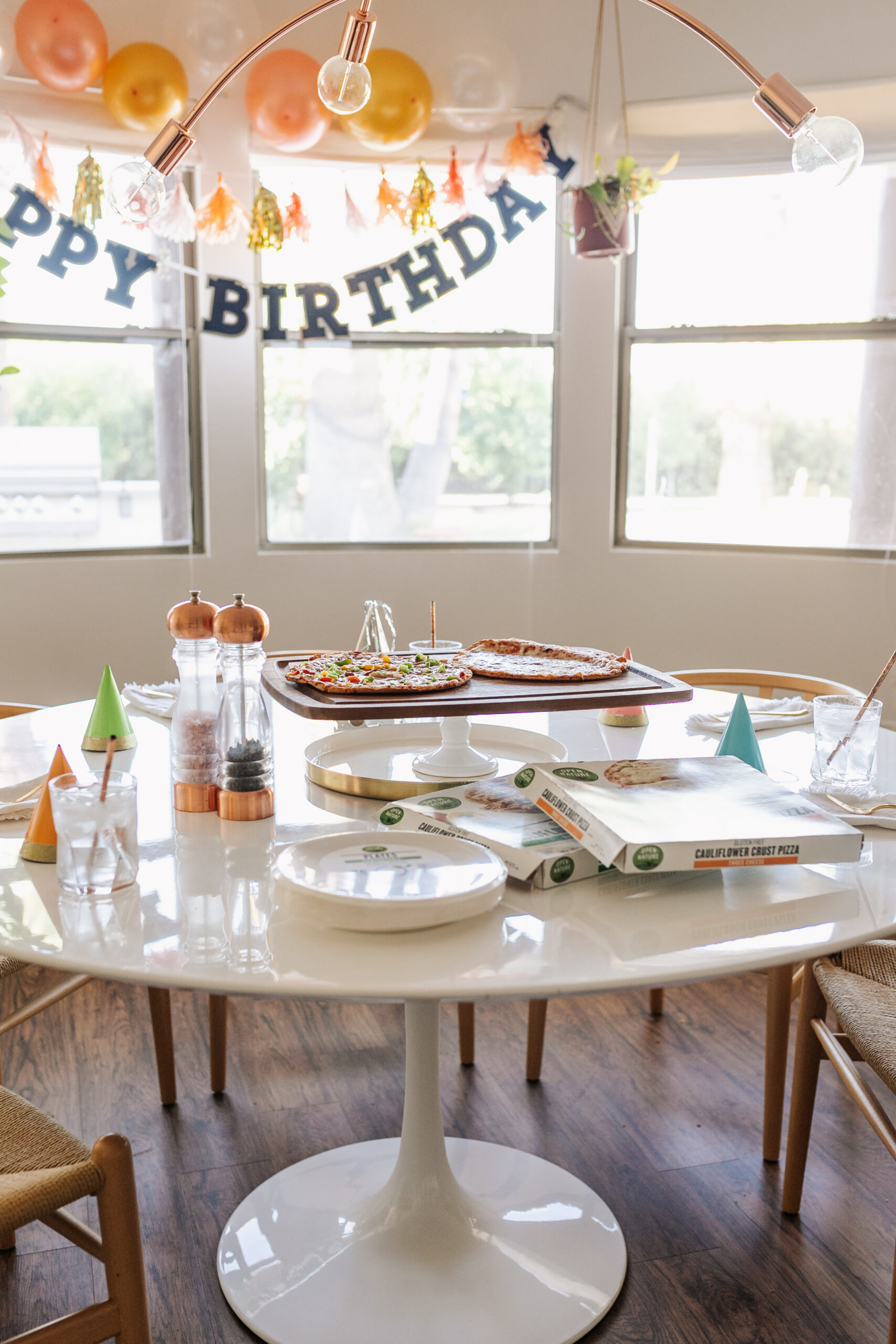 setting the table for pizza and cake for our our simple family birthday party at home. #thelovedesignedlife #pizzaandcake #opennature #oorganics #sfeway