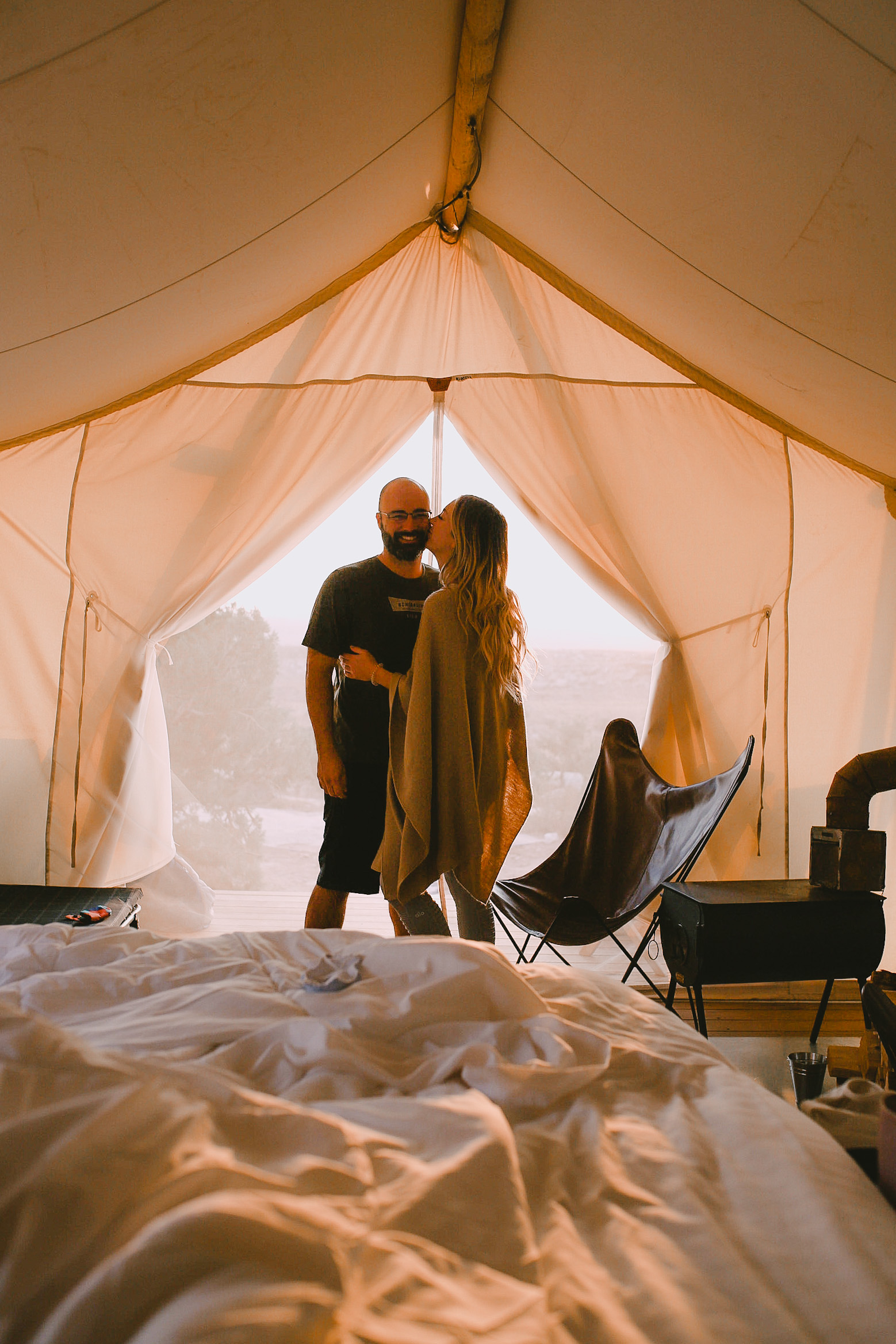 the inside of our cute little safari tent while on a glamping trip in moab utah