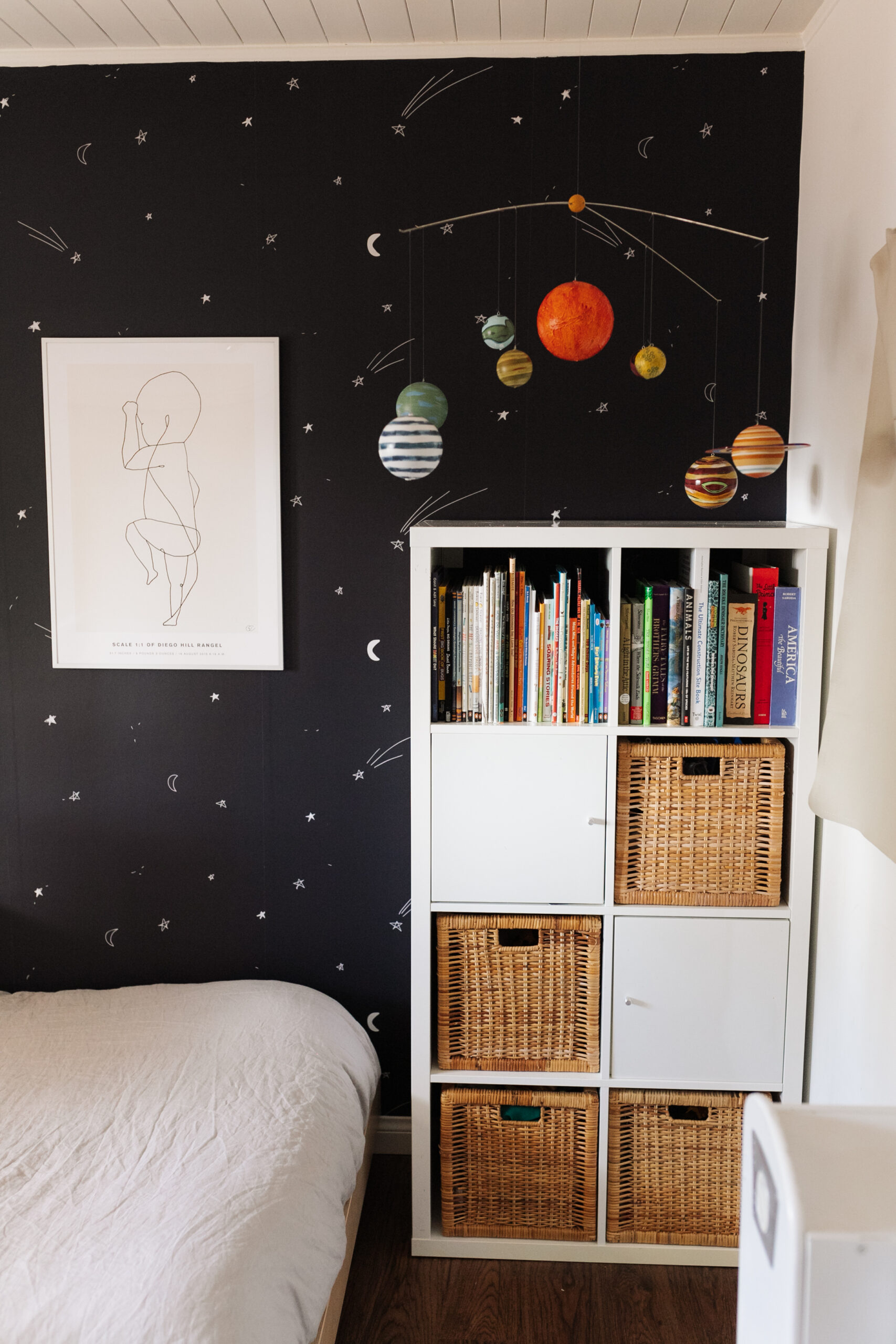 a cozy reading nook and play area for our big boy's space bedroom #boysroom #kidsroom #spacebedroom