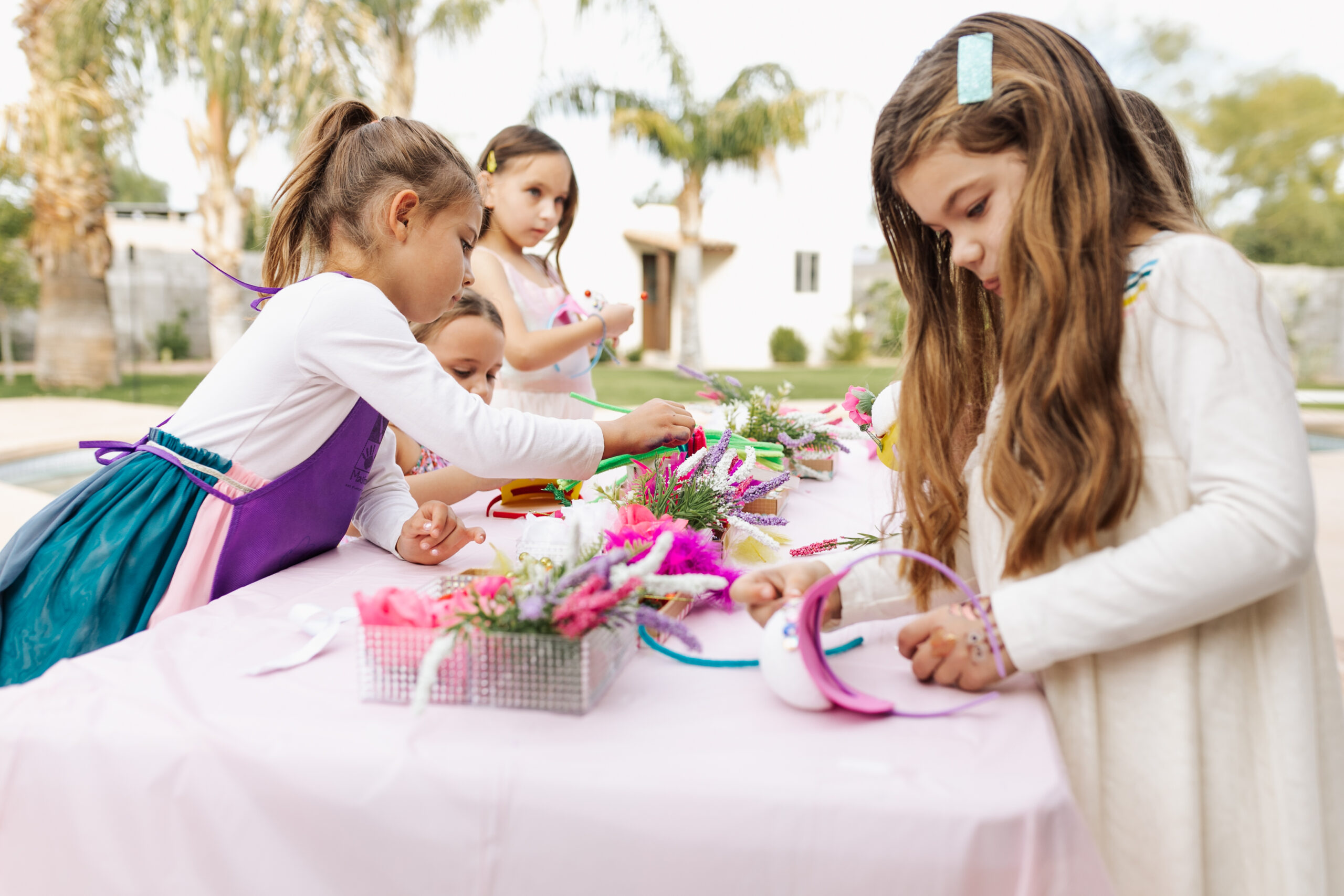 the girls working hard on their mad hats for this very merry unbirthday celebration #thelovedesignedlife #averymerryunbirthday #madhatterteaparty