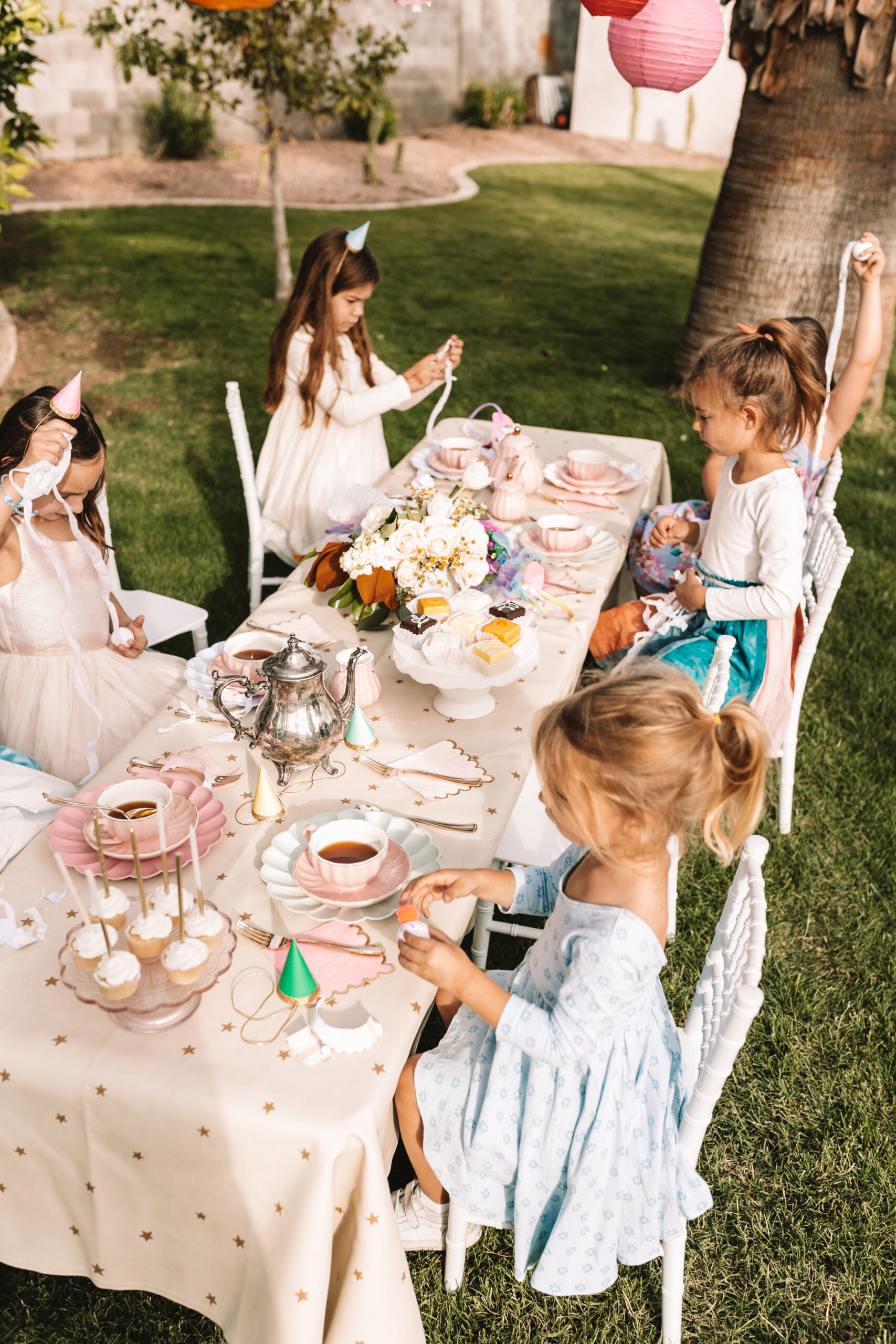 a very merry unbirthday tea party with mini cakes and real tea #thelovedesignedlife #teaparty #minicakes #petitfours