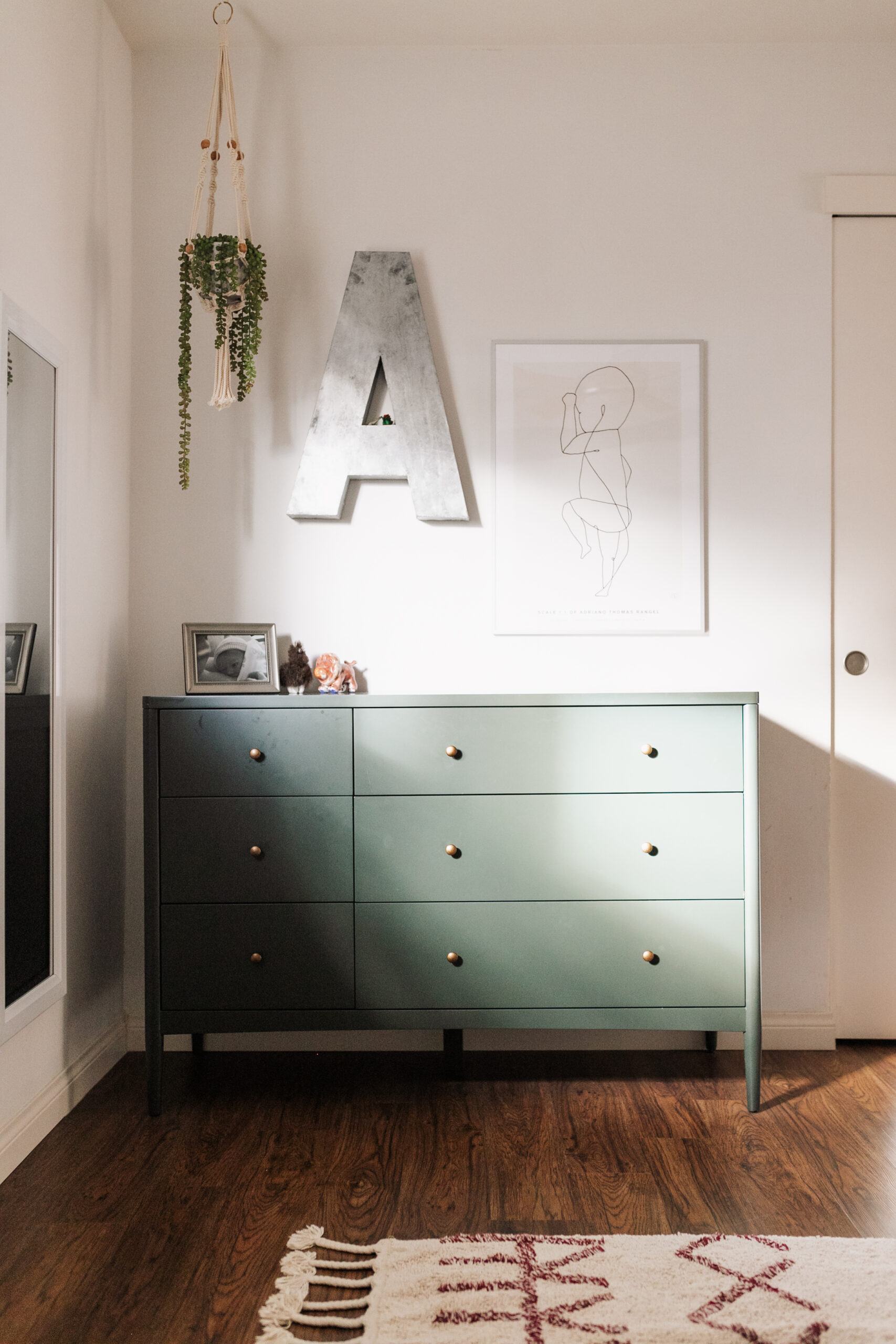 love the hunter green color of this mid-century modern inspired dresser #bigboyroom #forrestgreen #mcm #midcenturymodern #kidsroom