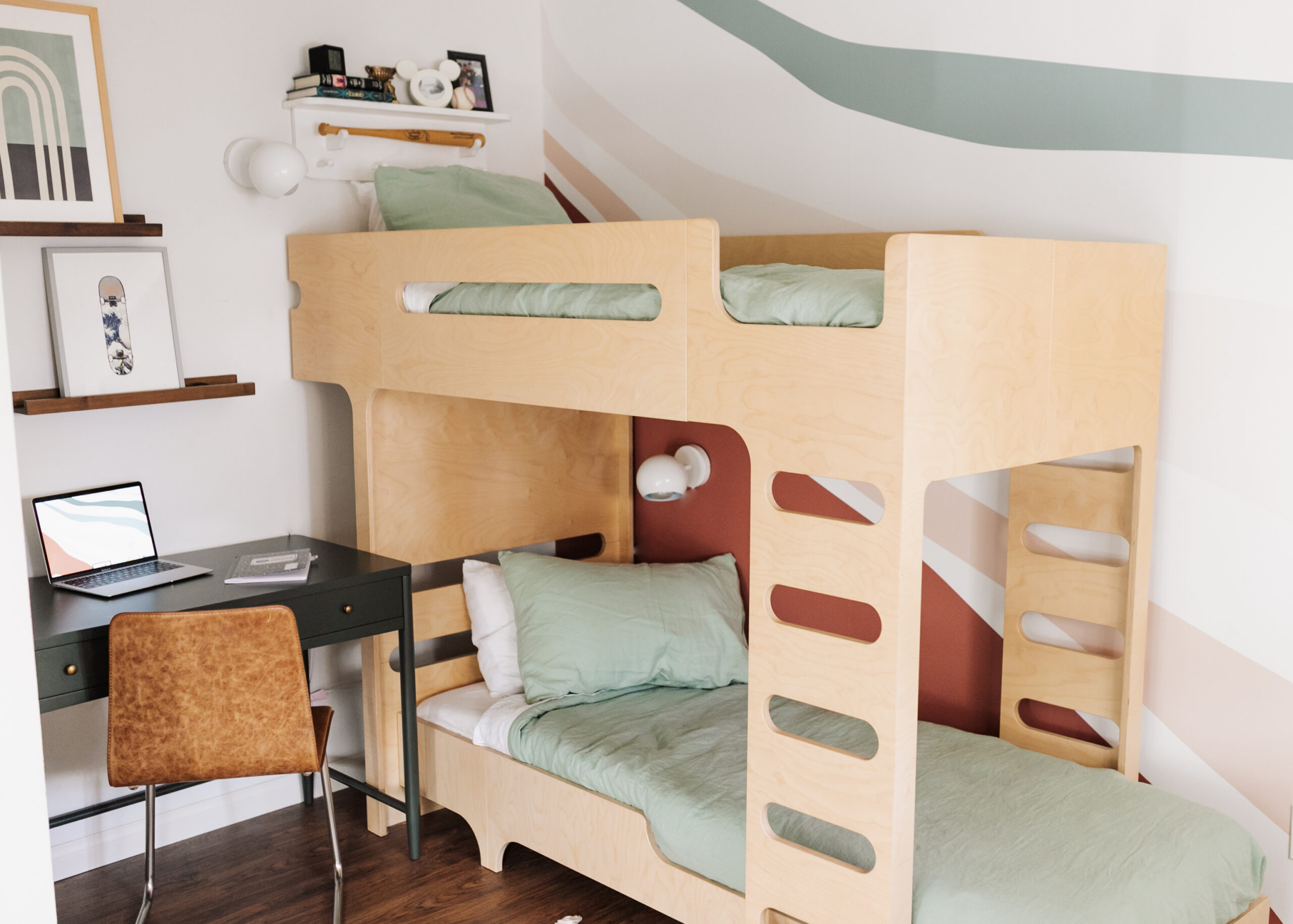 love how this streamlined bunk bed fits neatly into the corner of this small bedroom