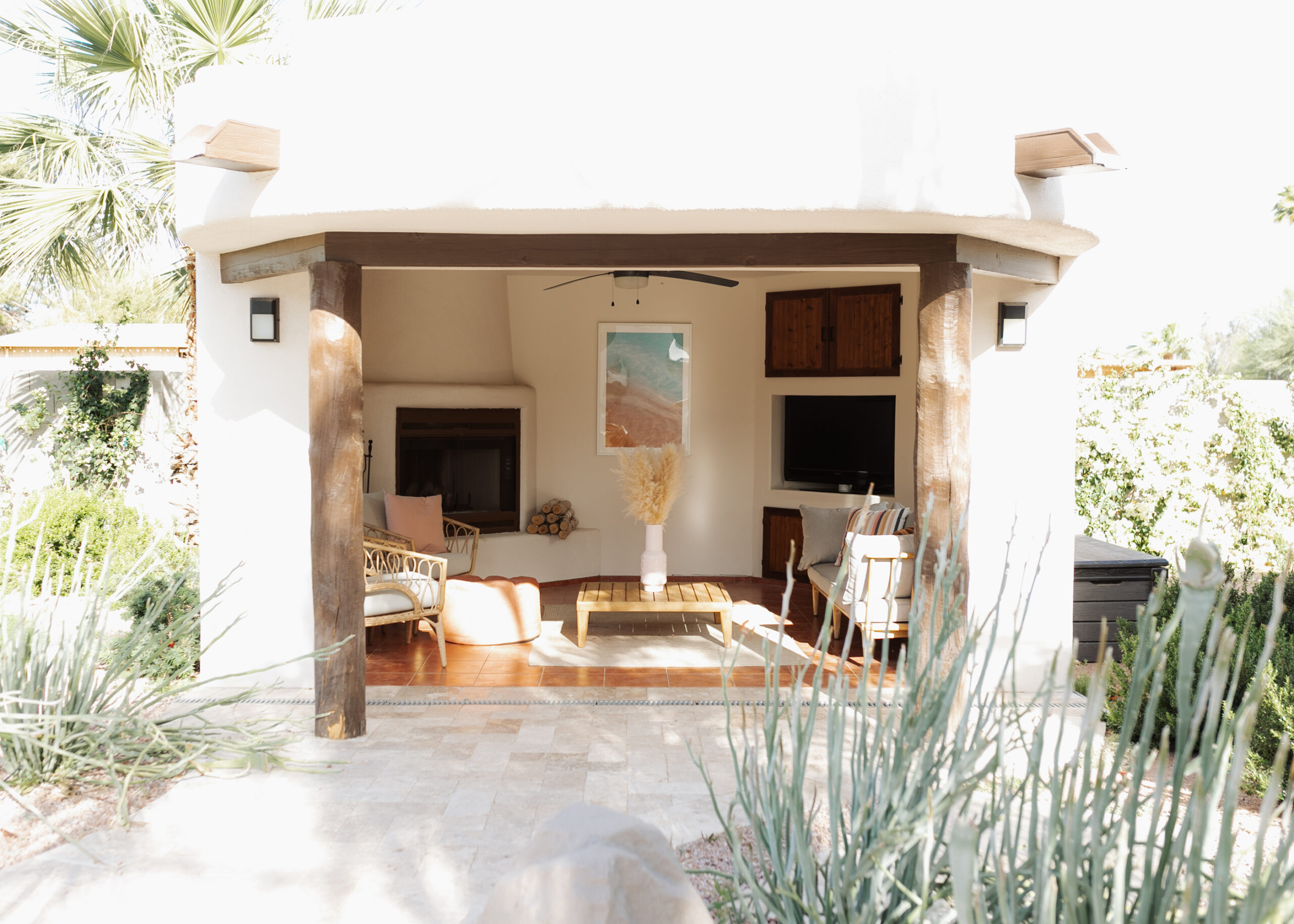 a peek at our pool ramada, with modern furniture and a beachy boho vibe #modernbackyard #arizonaliving #poolramada #backyarddesign