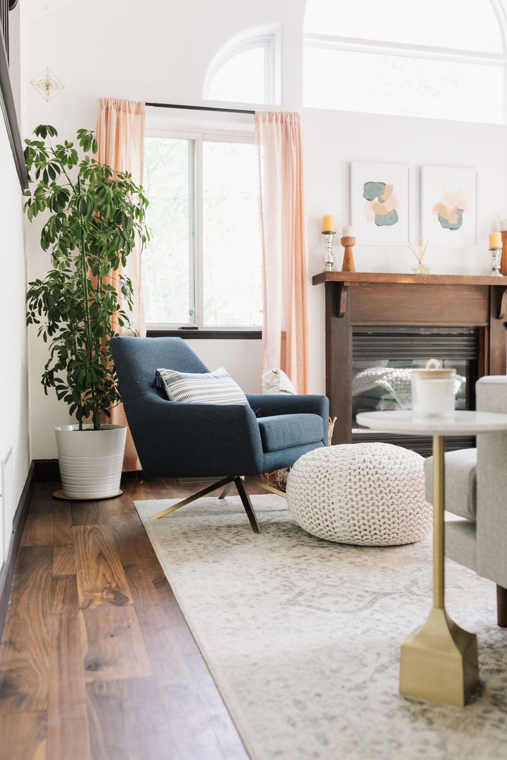 this functional ink blue swivel chair works perfectly in this multi-functional living room space #thelovedesignedlife #theldlhome #swivelchair #article #ourarticle #spininbluechair