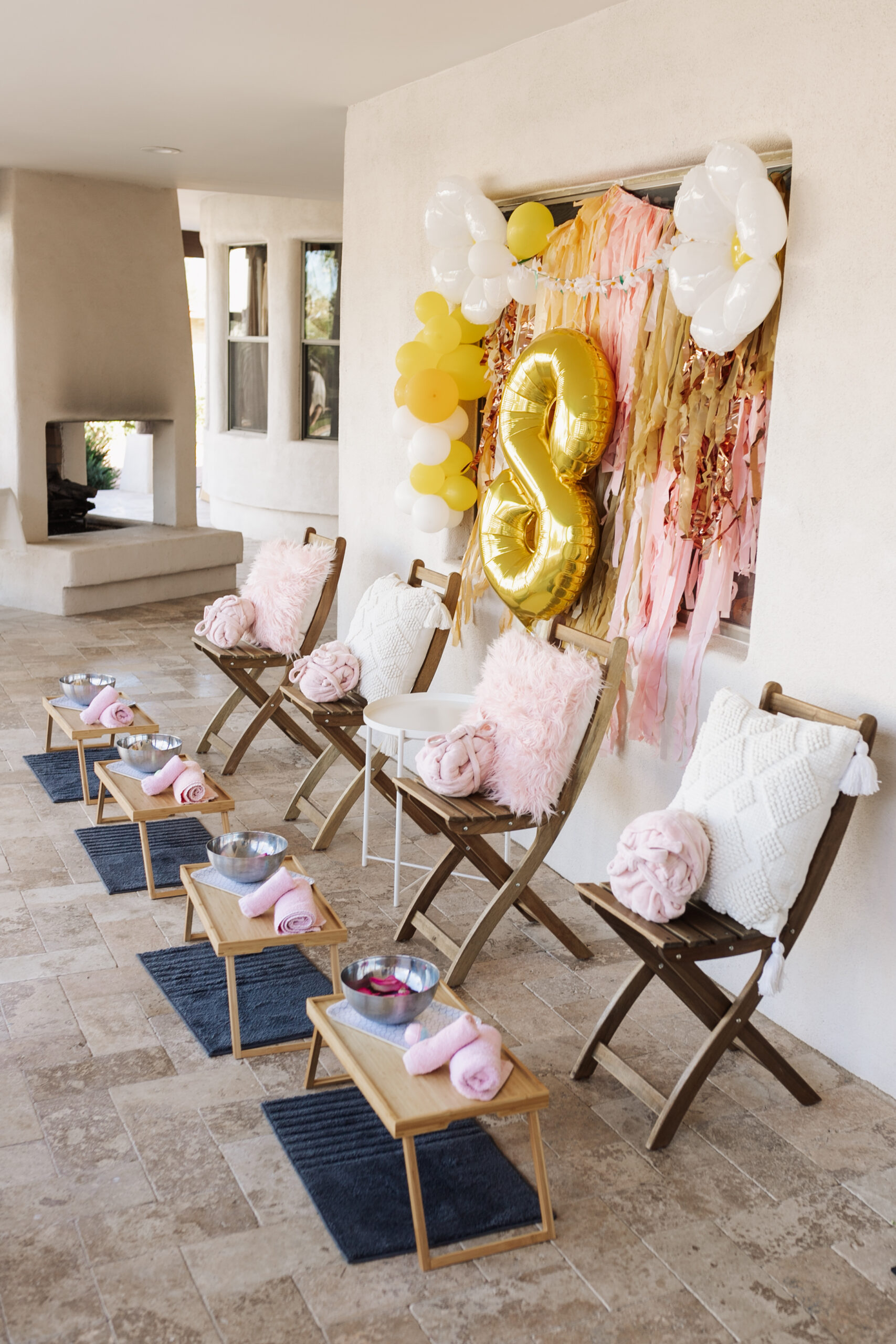 the girls' mani pedi station set up with Honey Bee Mobile Spa #thelovedesignedlife #girlsbirthday #birthdaypartyideas