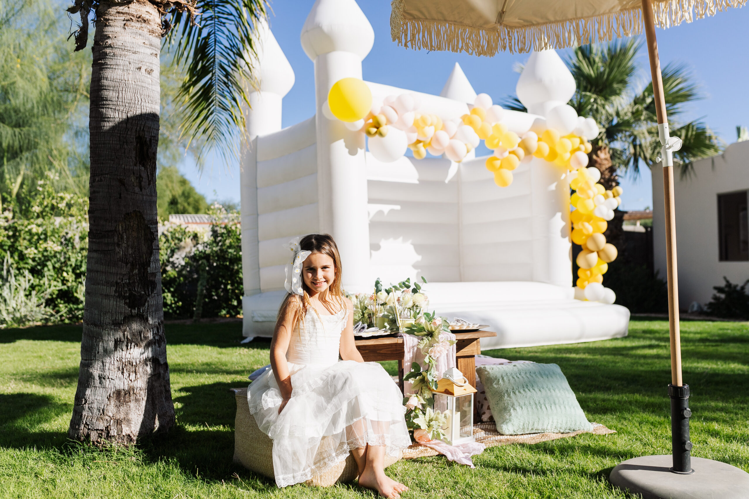 this white castle bounce house was the perfect touch for her 8th birthday party #whitebouncehouse #inflate48 #kidsbirtdayparty #honeybeebirthdayparty