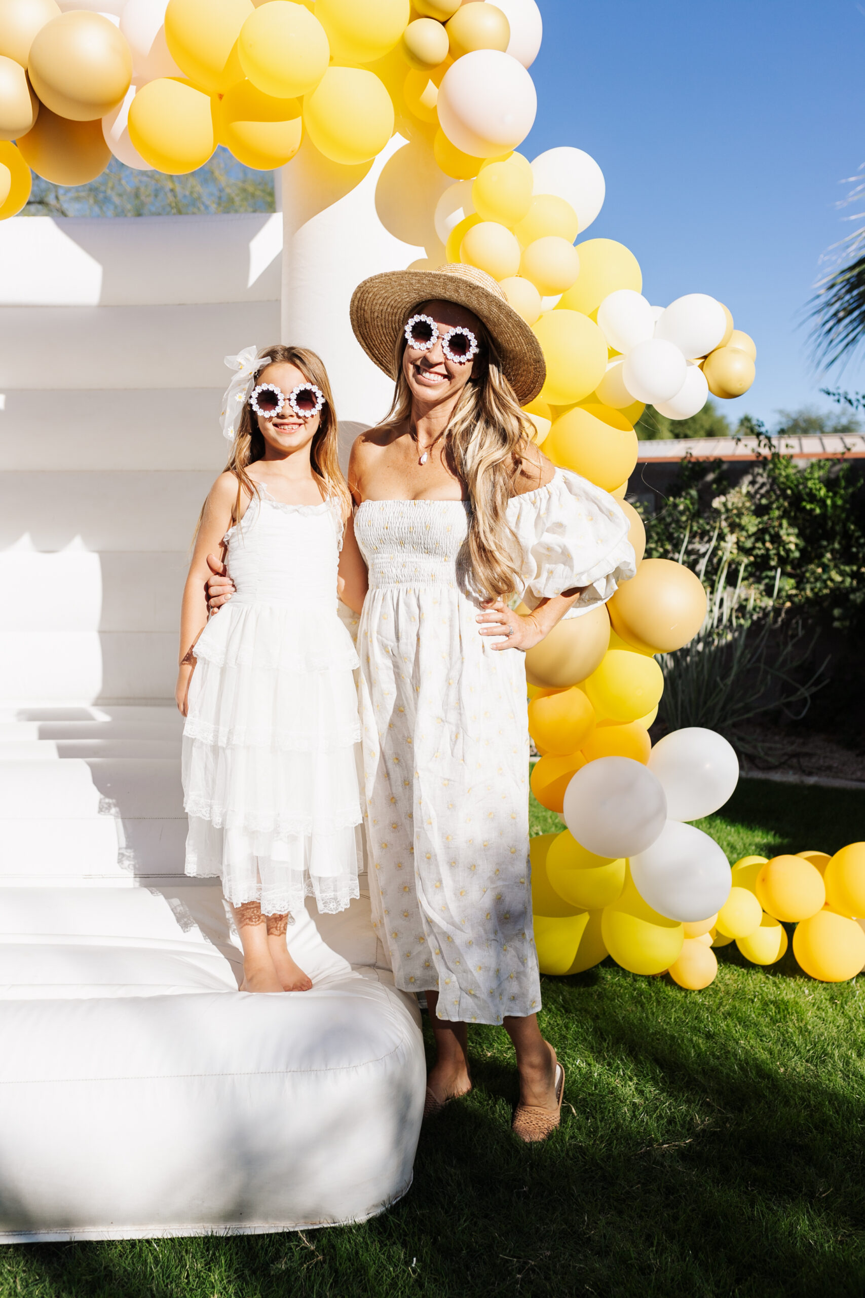 bounce house fun for her honeybee spa brithday party! #thelovedesignedlife #honeybeebirthdayparty #spabirthdayparty #girlsbirthdaypartyideas