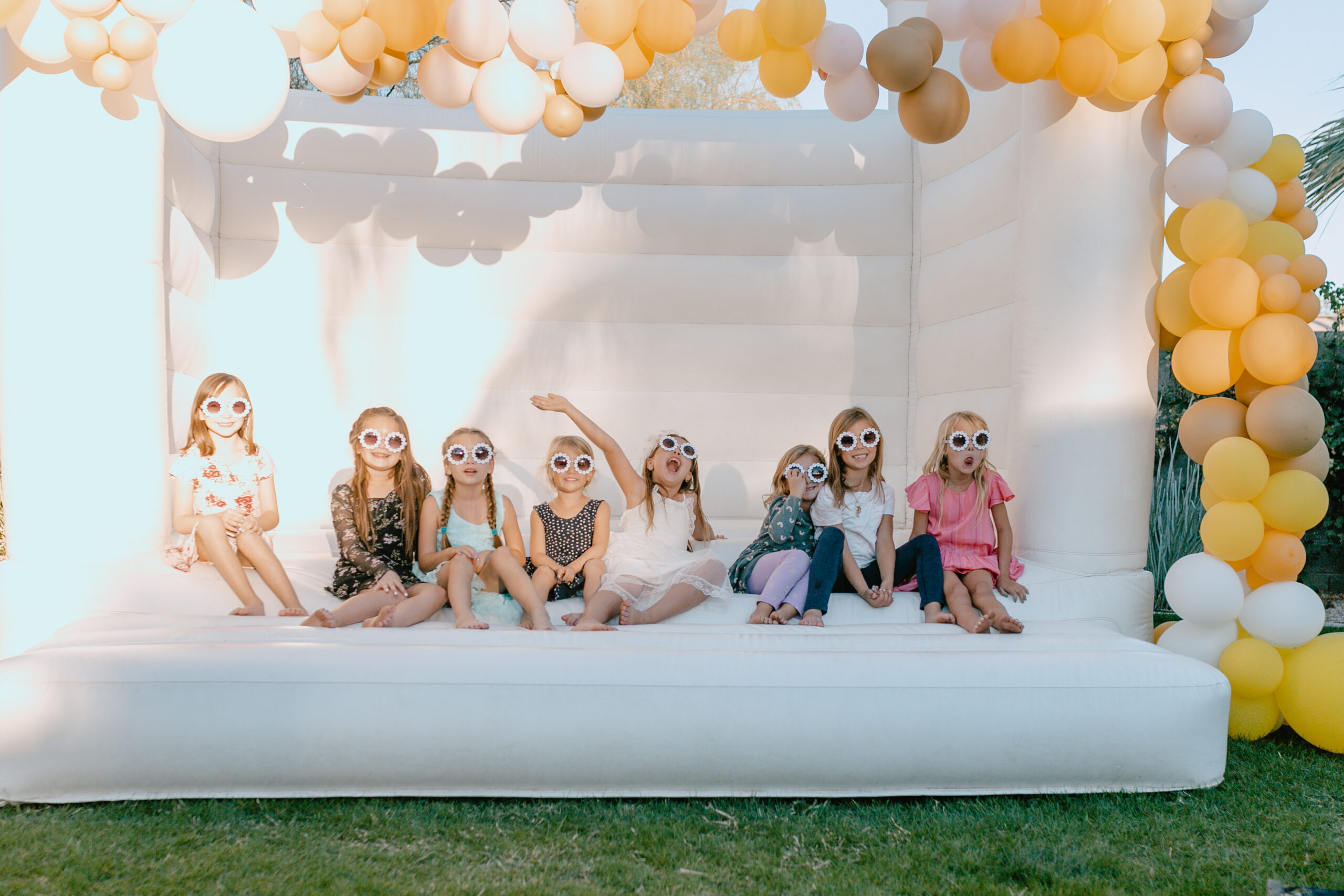 all the party guests in the bounce house! #thelovedesignedlife #whitebouncehouse #girlsbirthdayparty