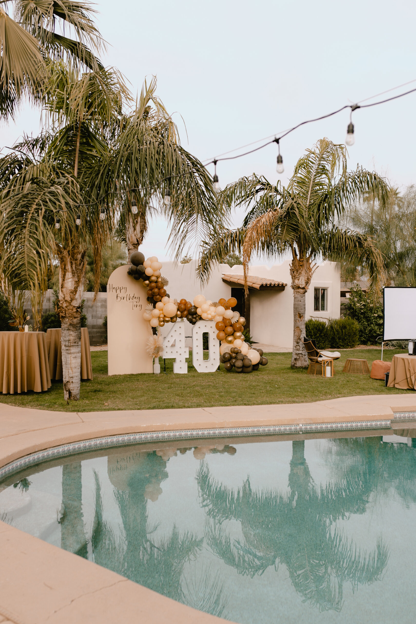 whiskey and cigar themed fortieth backyard birthday party #thelovedeisgnedlife #40thbirthdayparty #guysbirthdaypartyideas