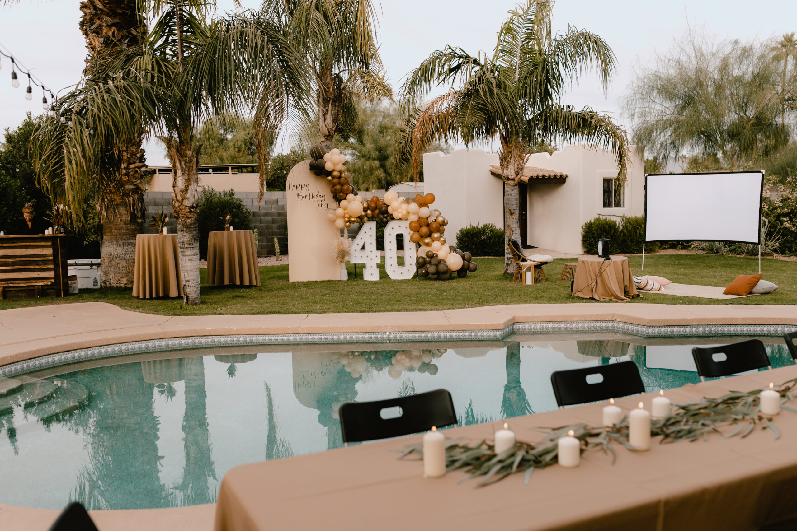 this backyard was the perfect backdrop for a whiskey + cigar themed 40th birthday party #theldlparties #whiskeyandcigars #backyardmovie