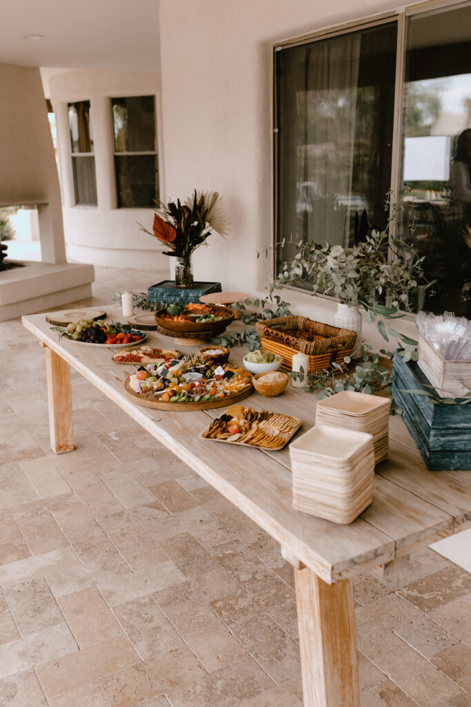 the food and appetizer table for this whiskey + cigar themed birthday party! #charcuterieboard #partyideas #milestonebirthdayparty