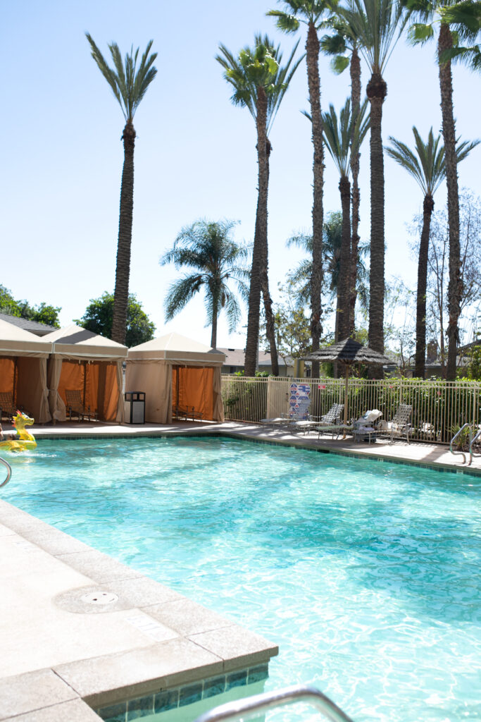 the beautiful pool area with complimentary cabanas at Delta by Marriott Anaheim