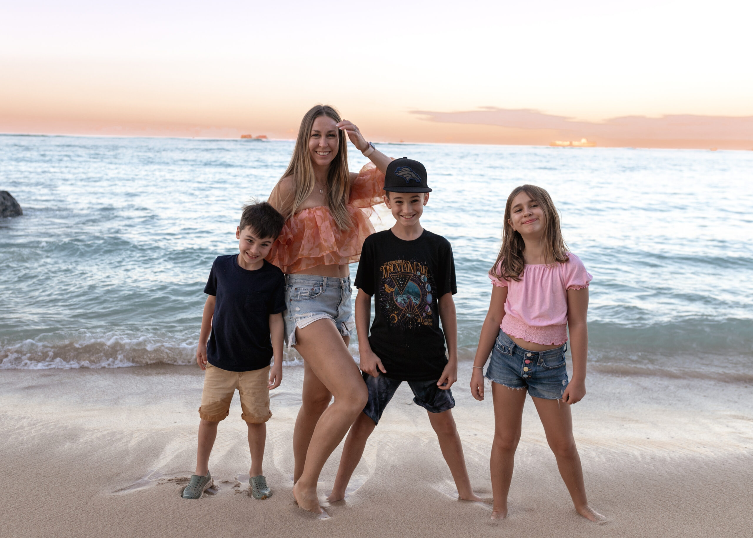sunrise by the beach in Oahu, Hawaii with me (mom) and my three kids