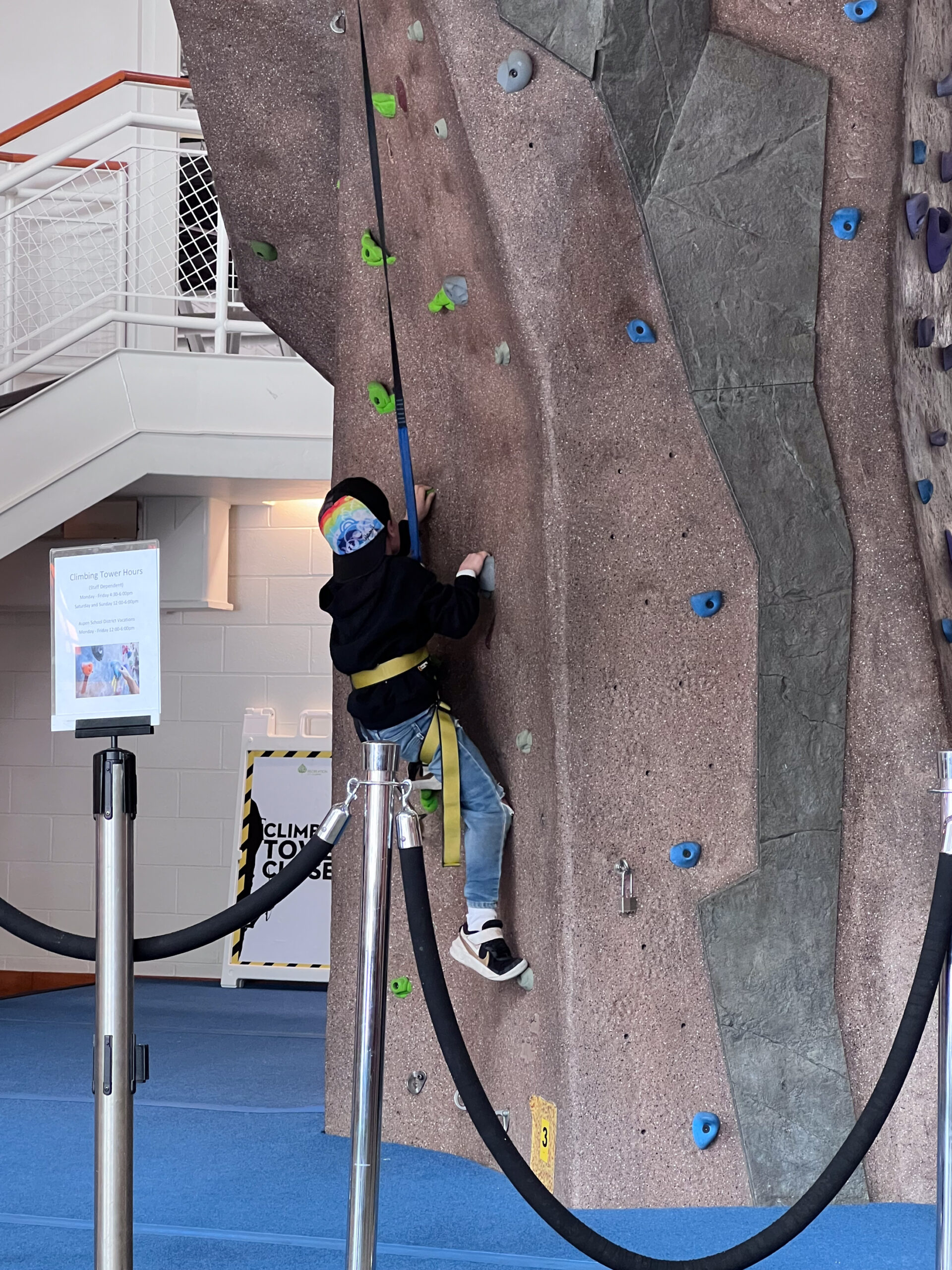 there is a rock climbing wall at the Aspen Recreation center (ARC) that's included too! #visitaspen #travelwithkids #theldltravles