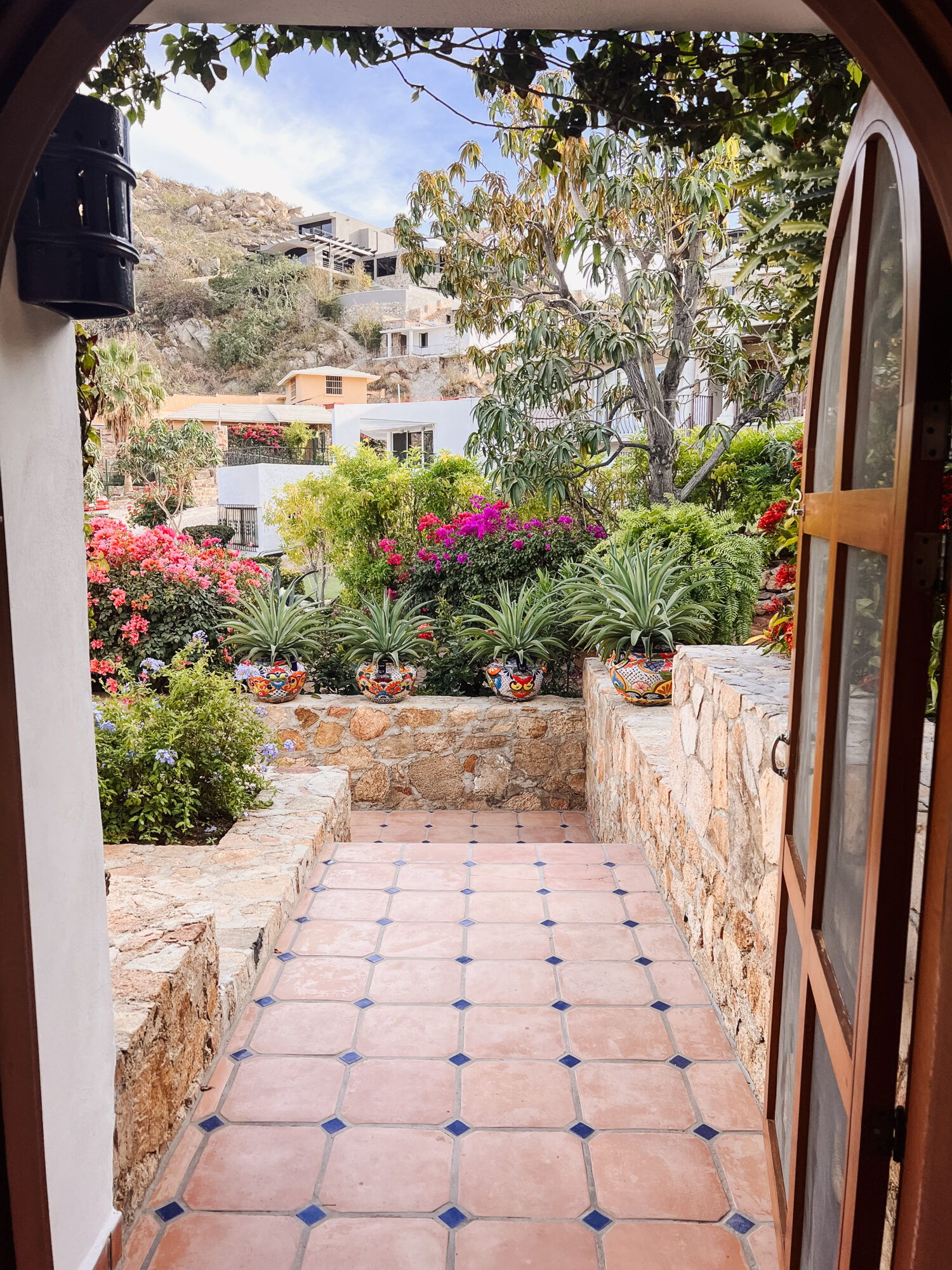 the cutest details of this spainish style baja californoa villa in cabo san lucas, mexico