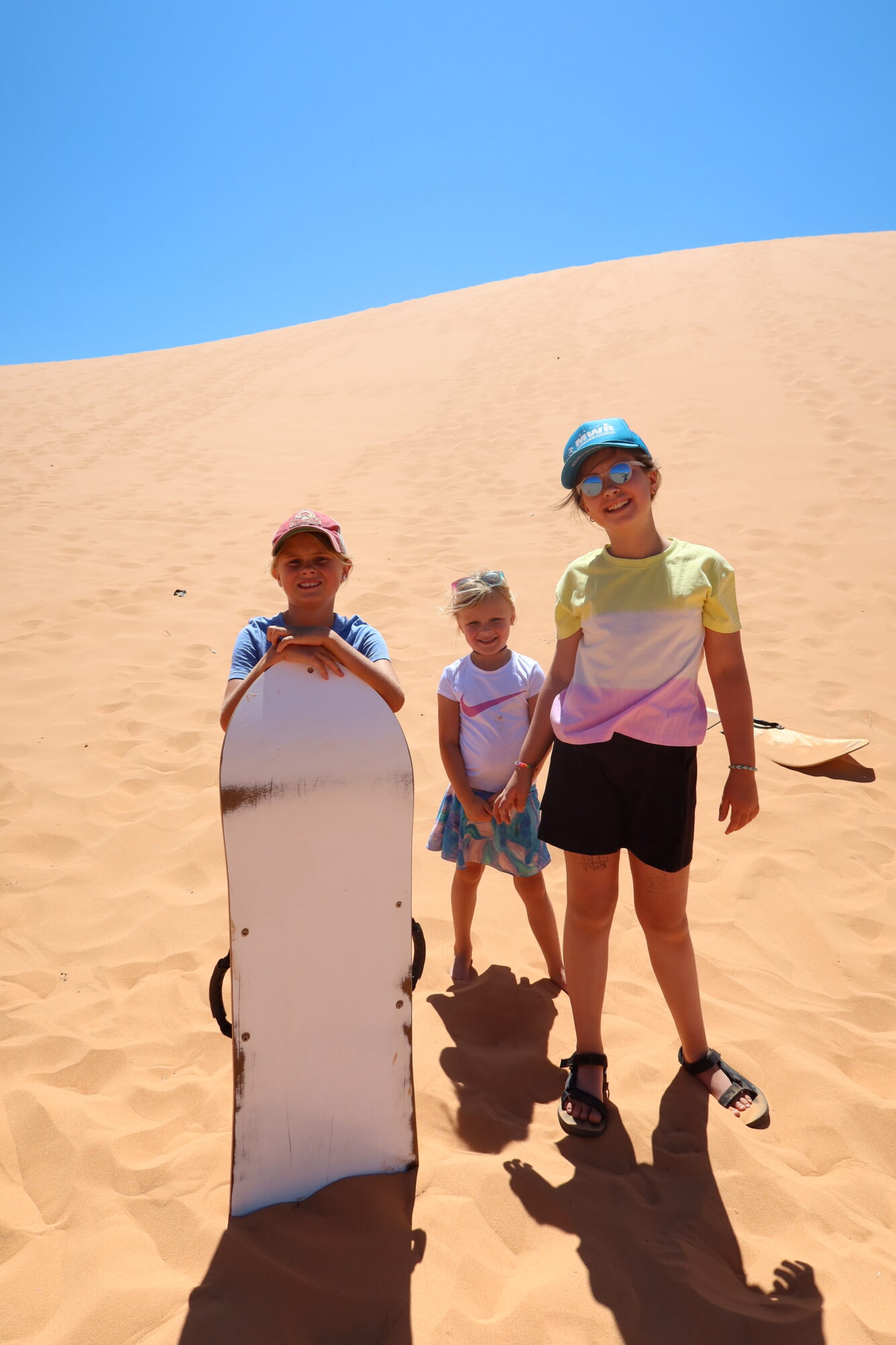 sand boarding in the Coral Pink Sand Dunes State Park in Utah